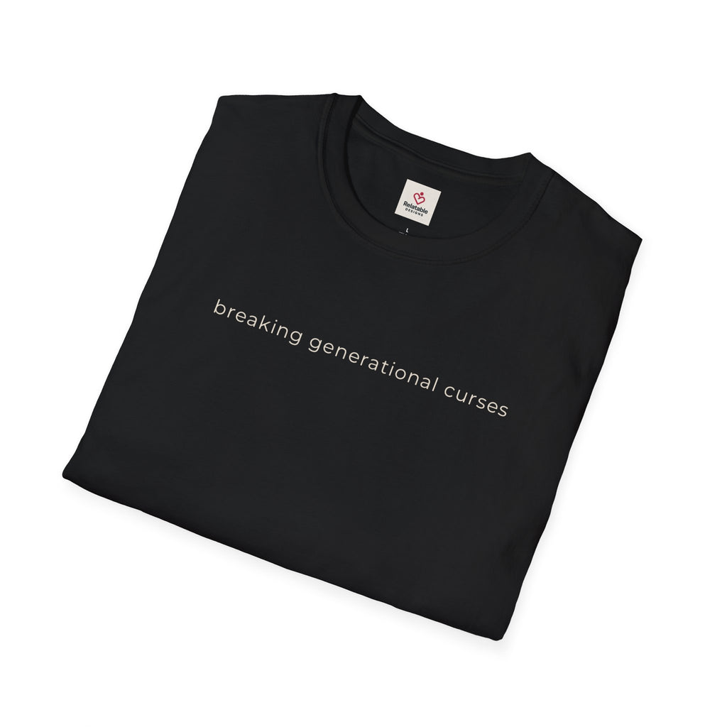 Folded black t-shirt with 'breaking generational curses' text on a white background