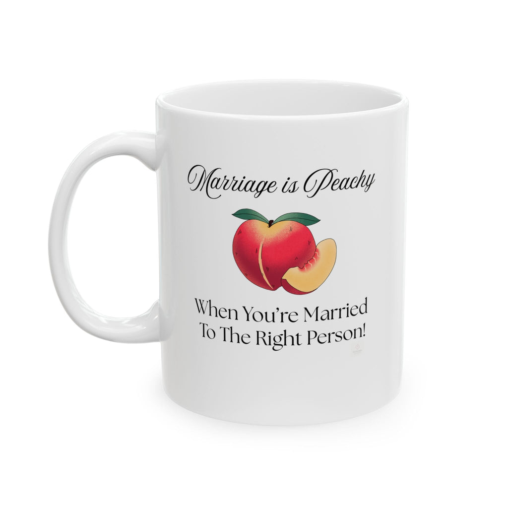 White ceramic mug with a peach illustration and romantic text on a white background