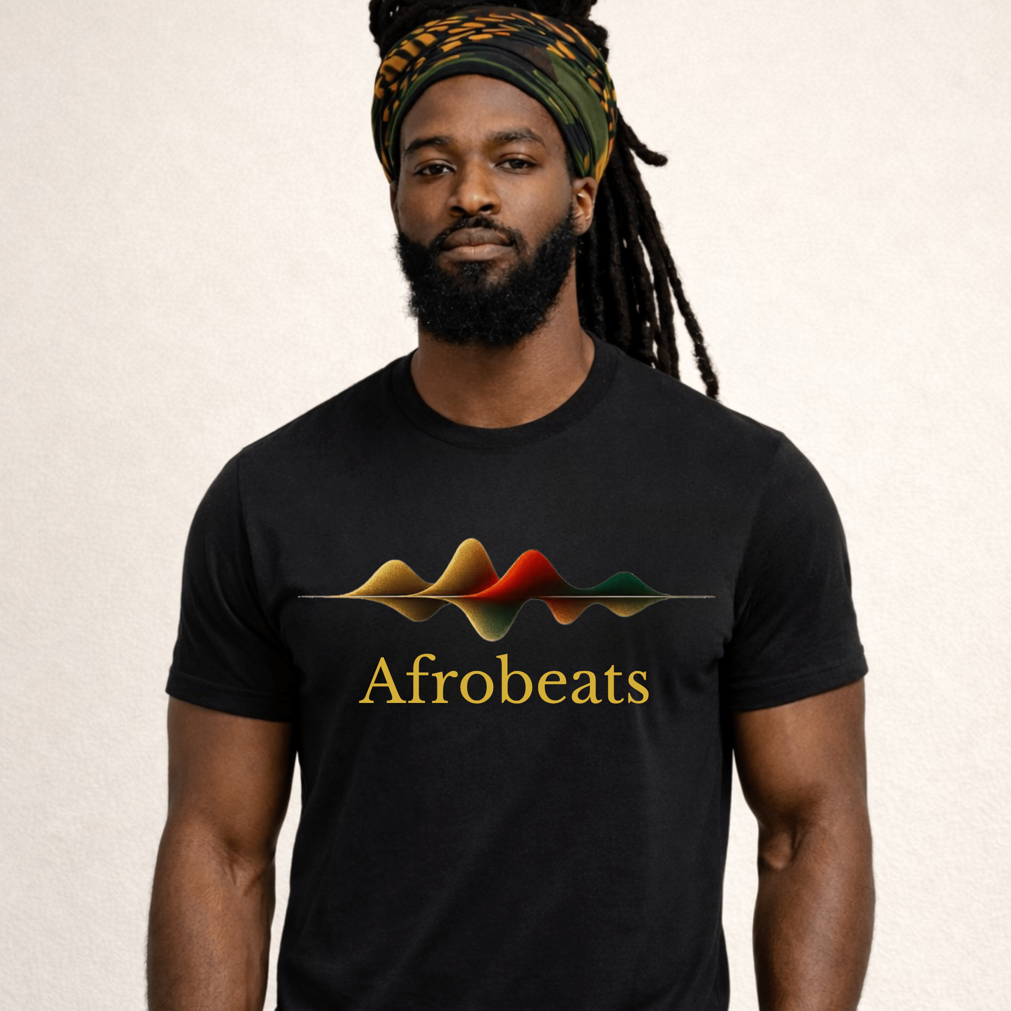 Male model wearing a black t-shirt with 'Afrobeats' design and colorful sound waves on a beige background