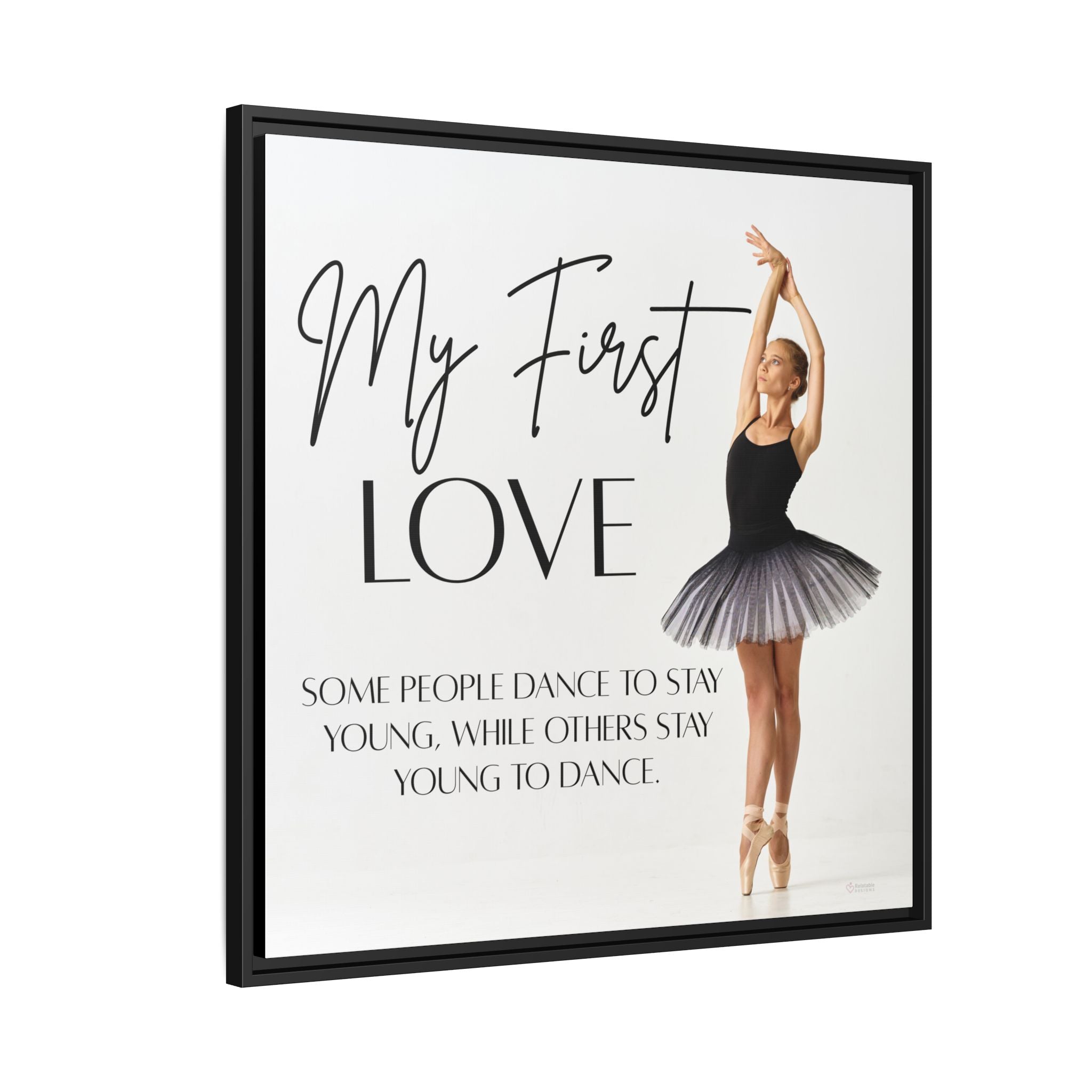 Framed artwork with a ballerina and motivational quote 'My First Love' on a white background. 