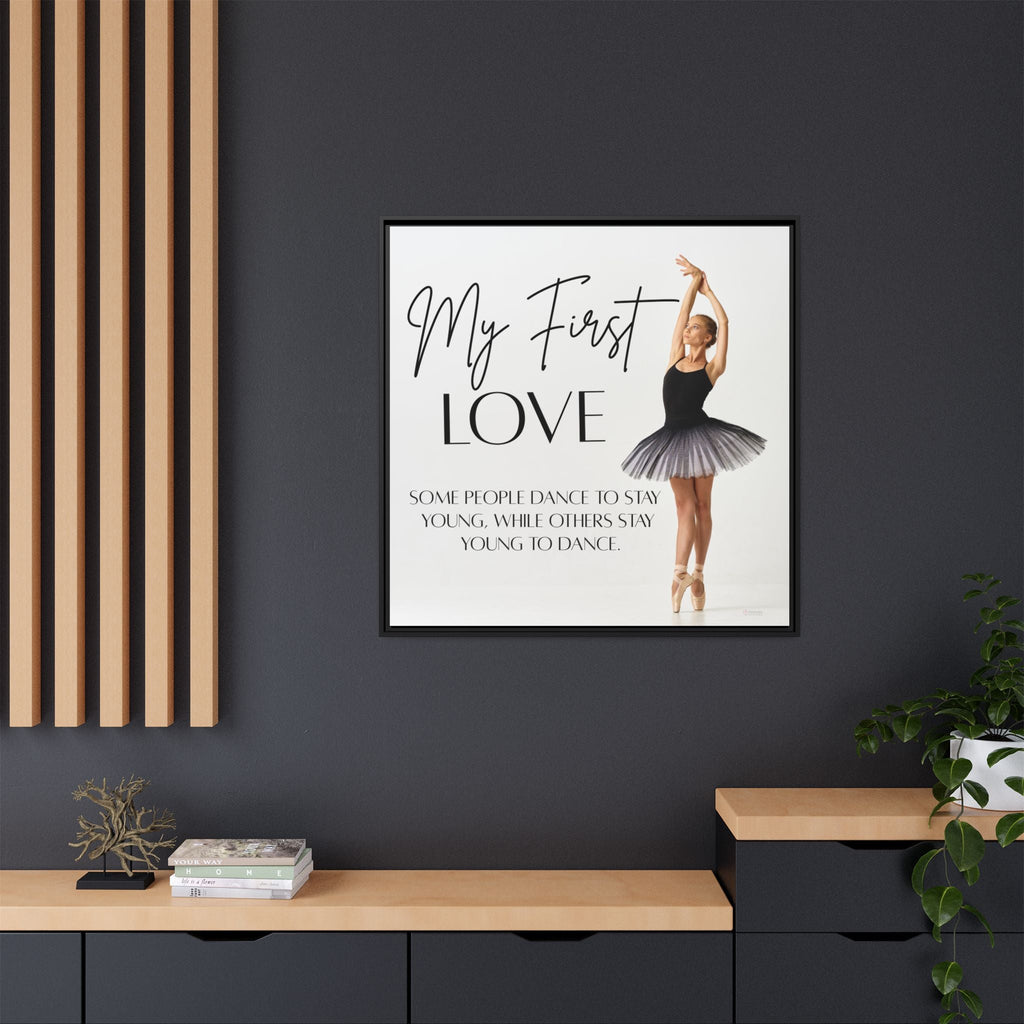 Framed artwork of a ballerina with text 'My First Love' on a dark wall.