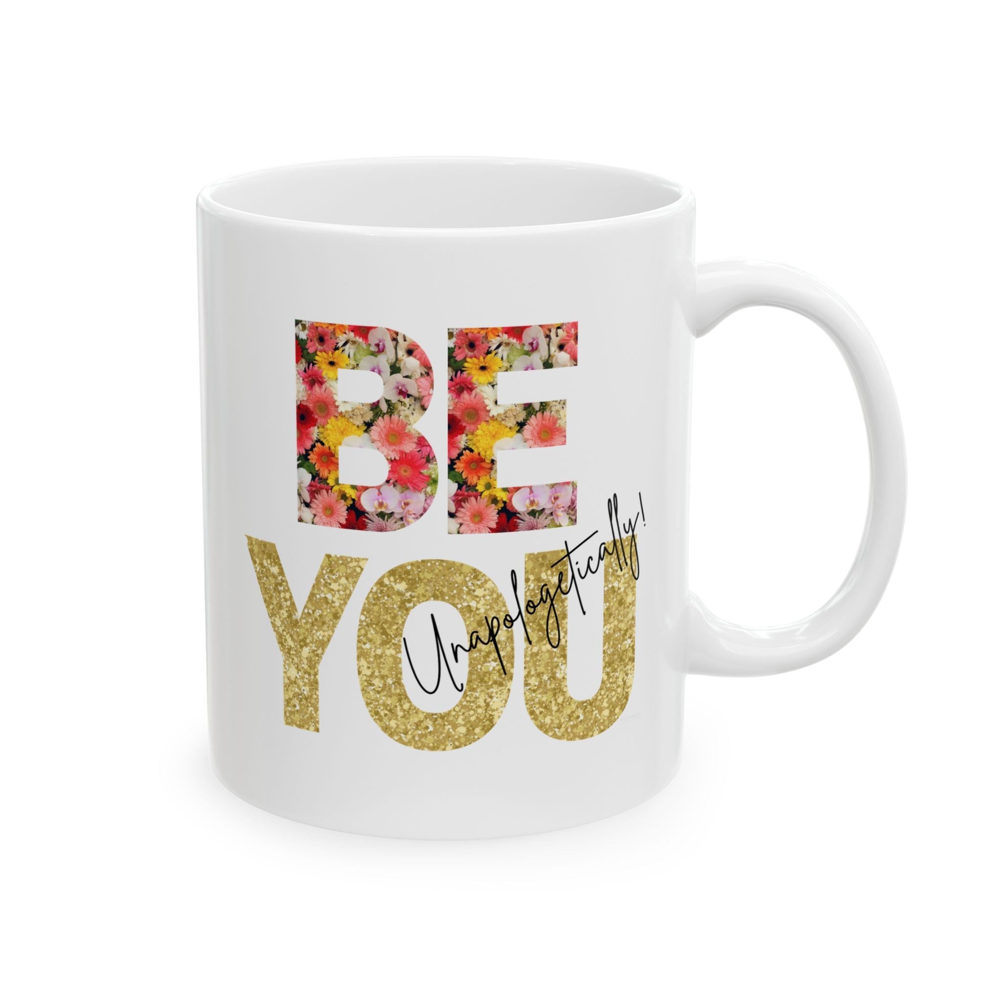 White ceramic mug with floral 'BE' and gold 'You' text on a white background by Relatable Designs. Left view.