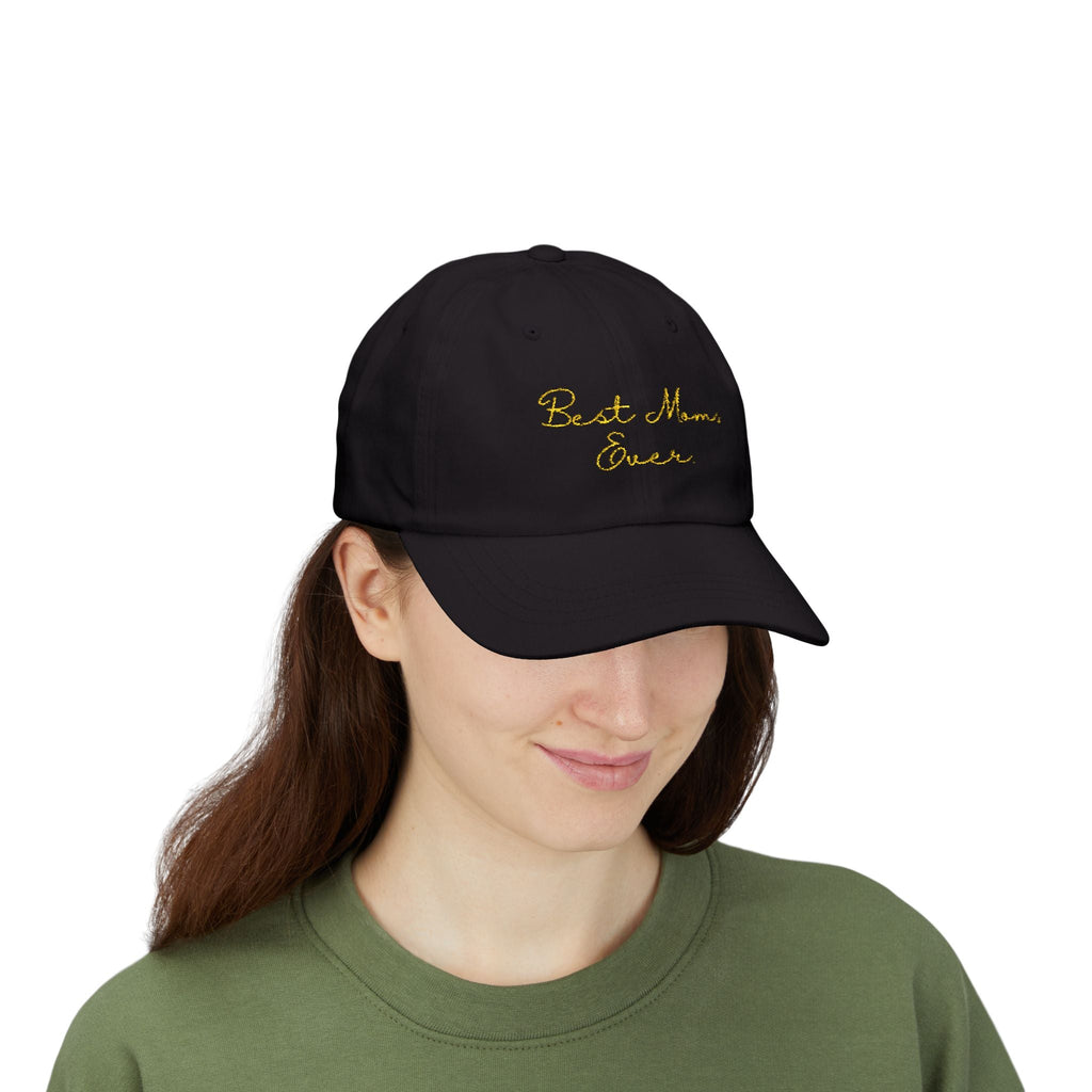 Person wearing a black cap with 'Best Mom Ever' text on a white background