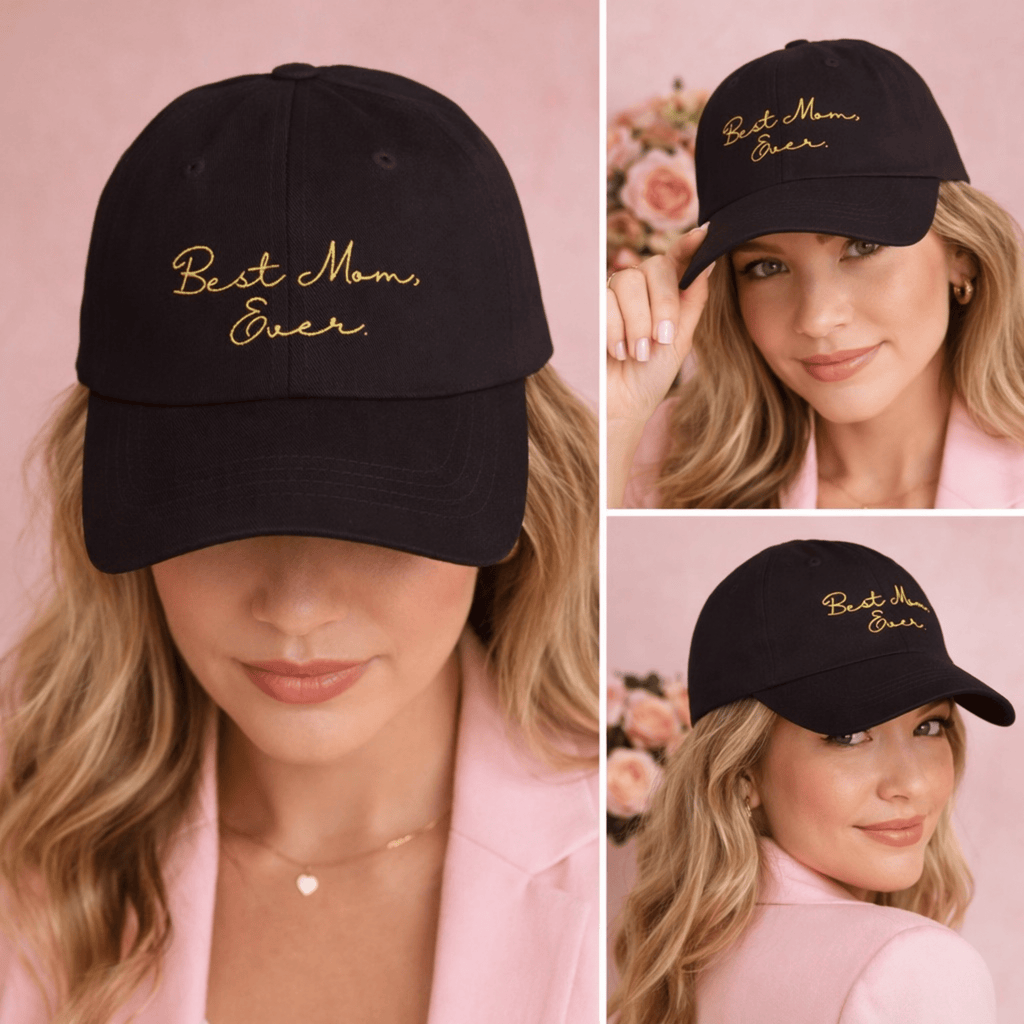Black cap with 'Best Mom Ever' text worn by a woman on a pink background