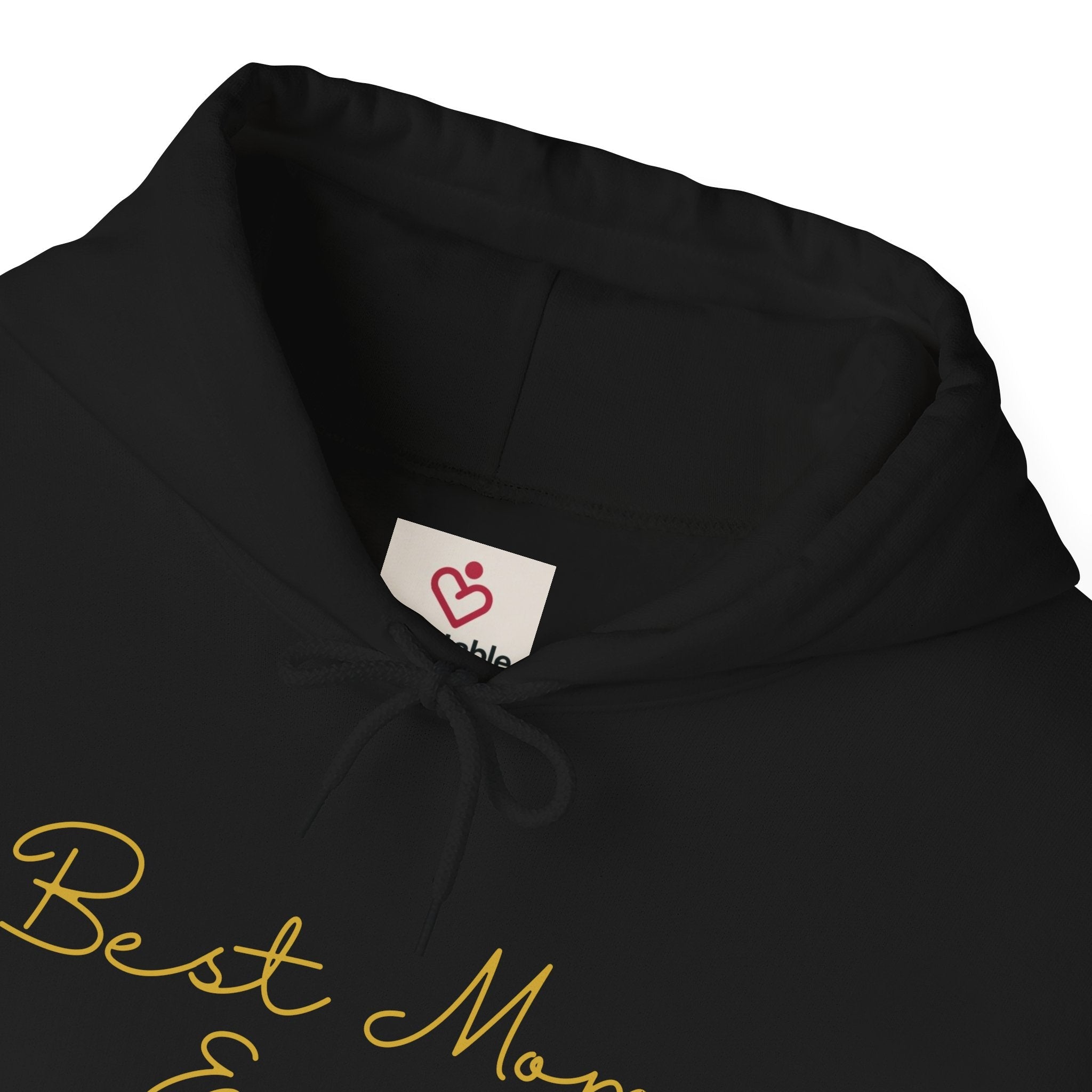 Black hoodie with 'Best Mom' text and a visible brand label on a white background