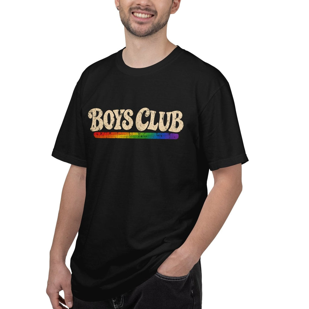 Person wearing a black t-shirt with 'BOYS CLUB' in rainbow letters and black denim jeans on a white background