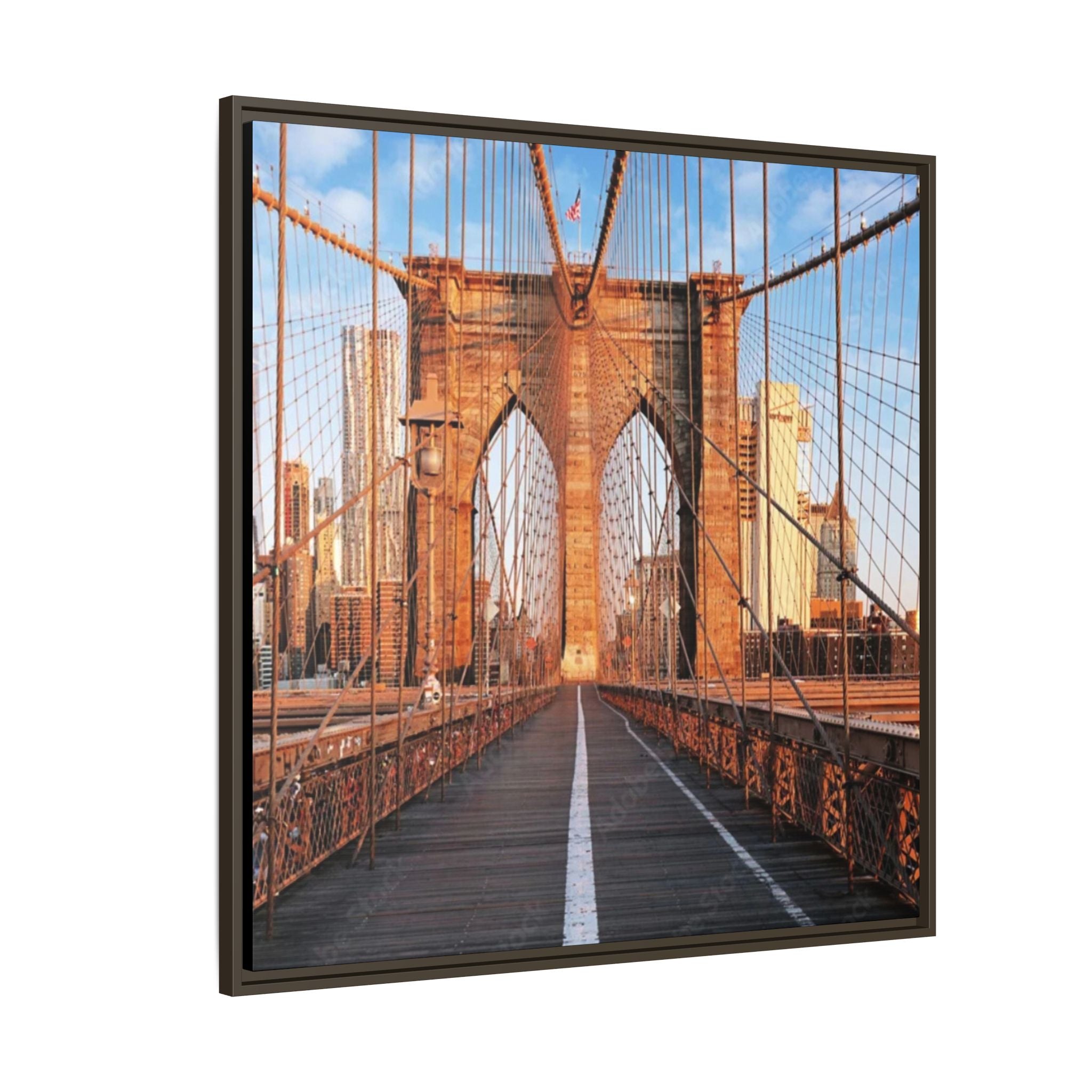 Framed canvas photograph of the Brooklyn Bridge with a clear sky.