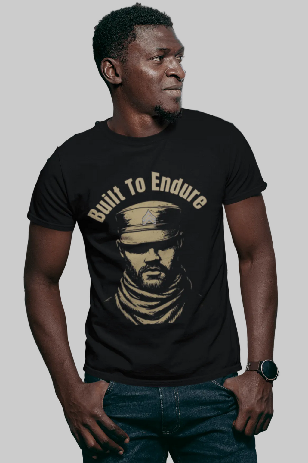 Relatable Designs black graphic t-shirt "Built to Endure" warrior statement tee styled with jeans men's strong masculine fashion mock-up