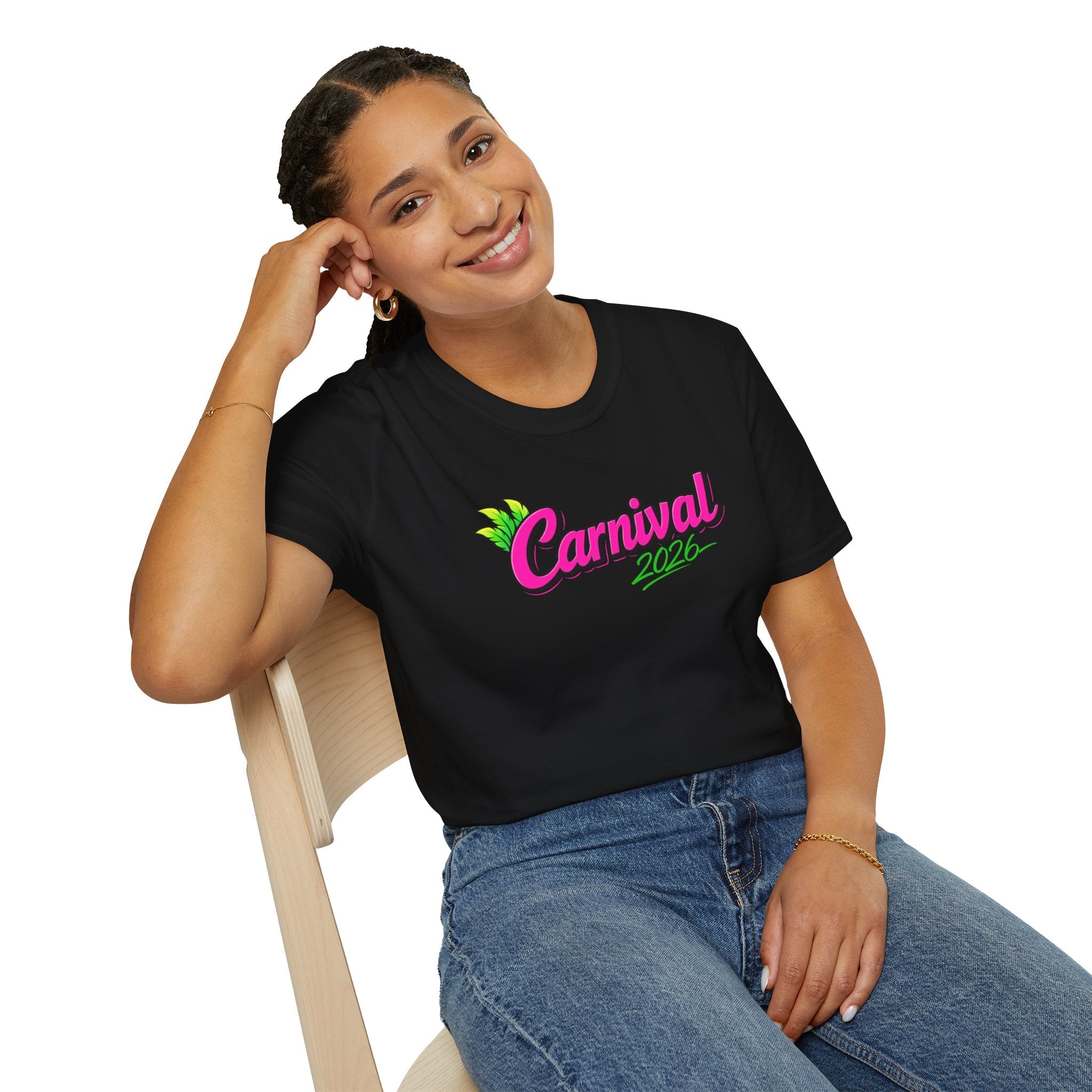 Woman sitting in chair wearing a black t-shirt with 'Carnival 2026' text in neon pink. 