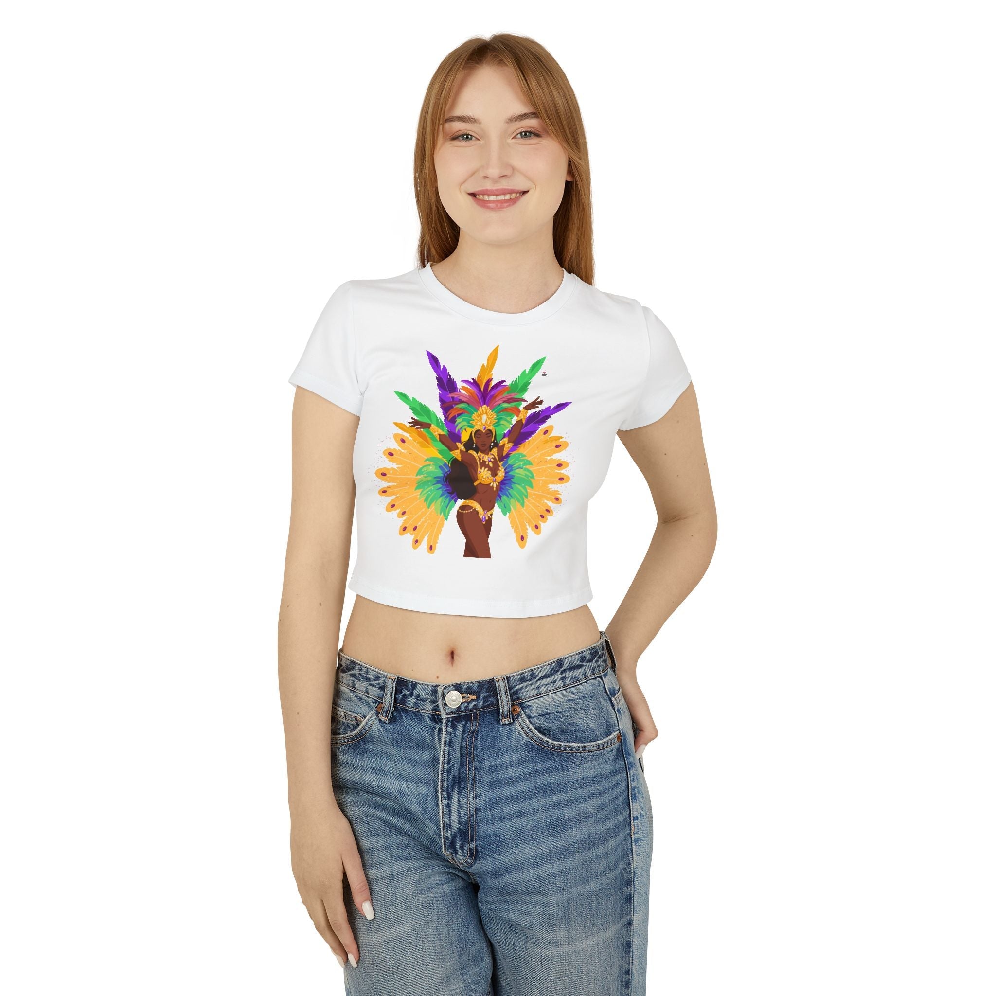 Woman wearing a white crop baby tee with a colorful carnival design and blue jeans on a white background