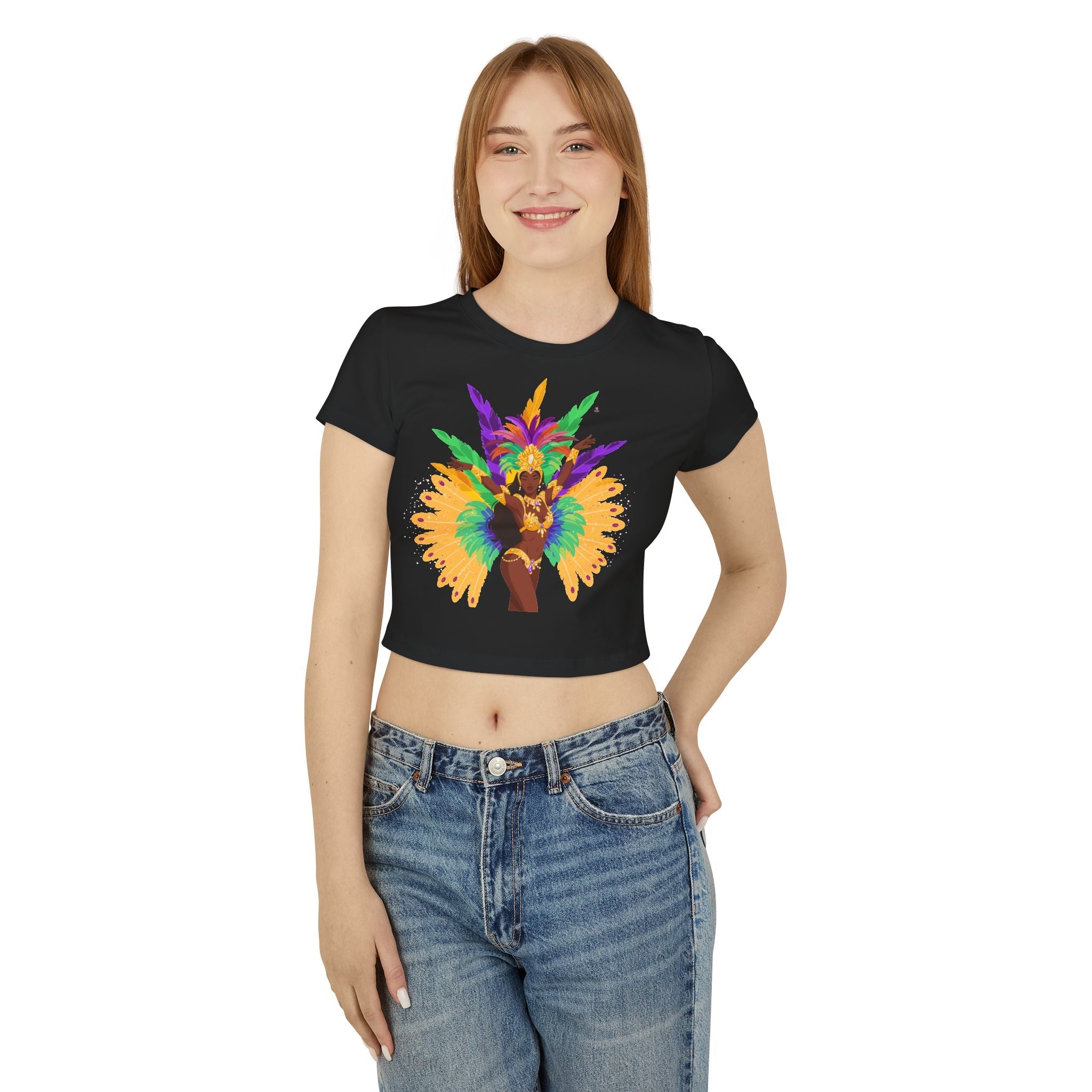 Person wearing a graphic black baby tee with a colorful carnival design and blue jeans on a white background