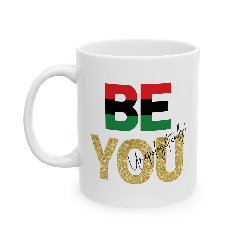 White mug with motivational text 'BE YOU Unapologetically' in colorful letters on a white background - left view