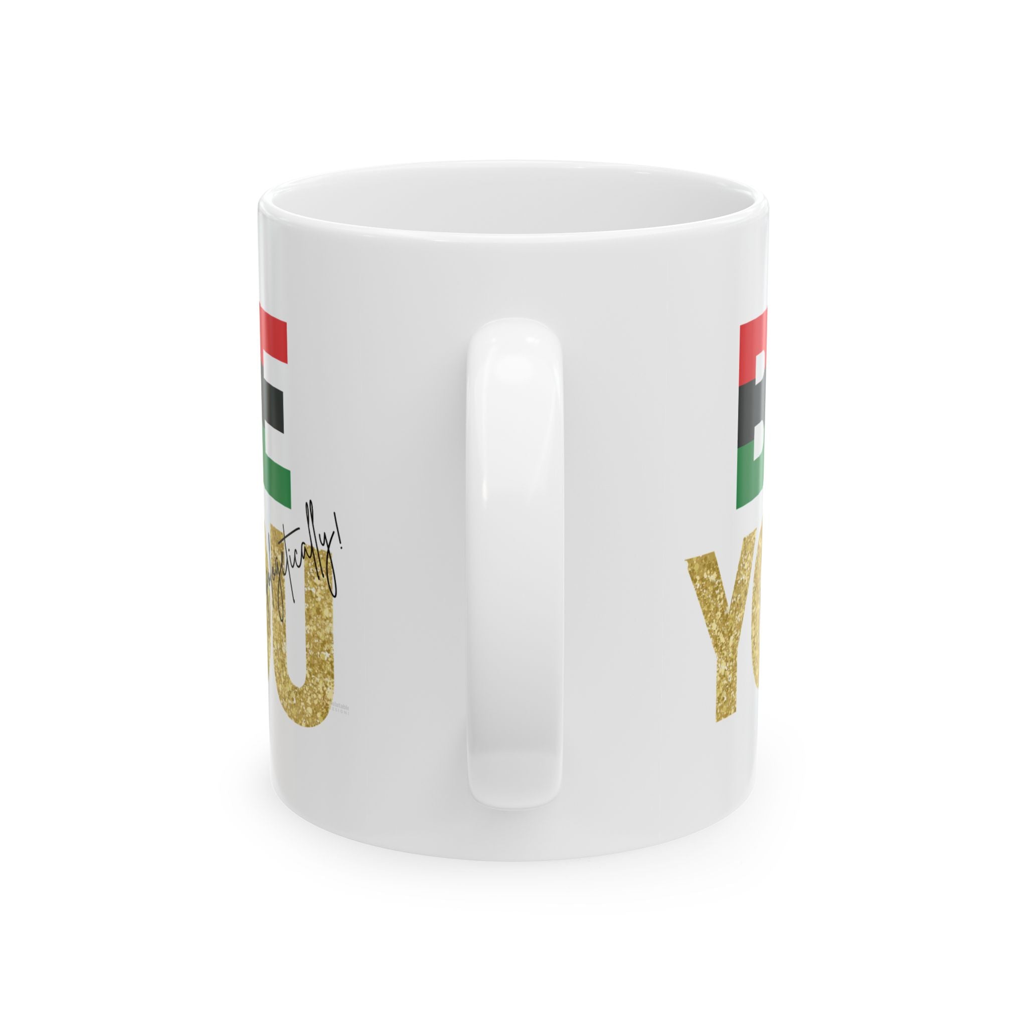 White ceramic 'Be You' mug with African heritage colors text and design on a white background