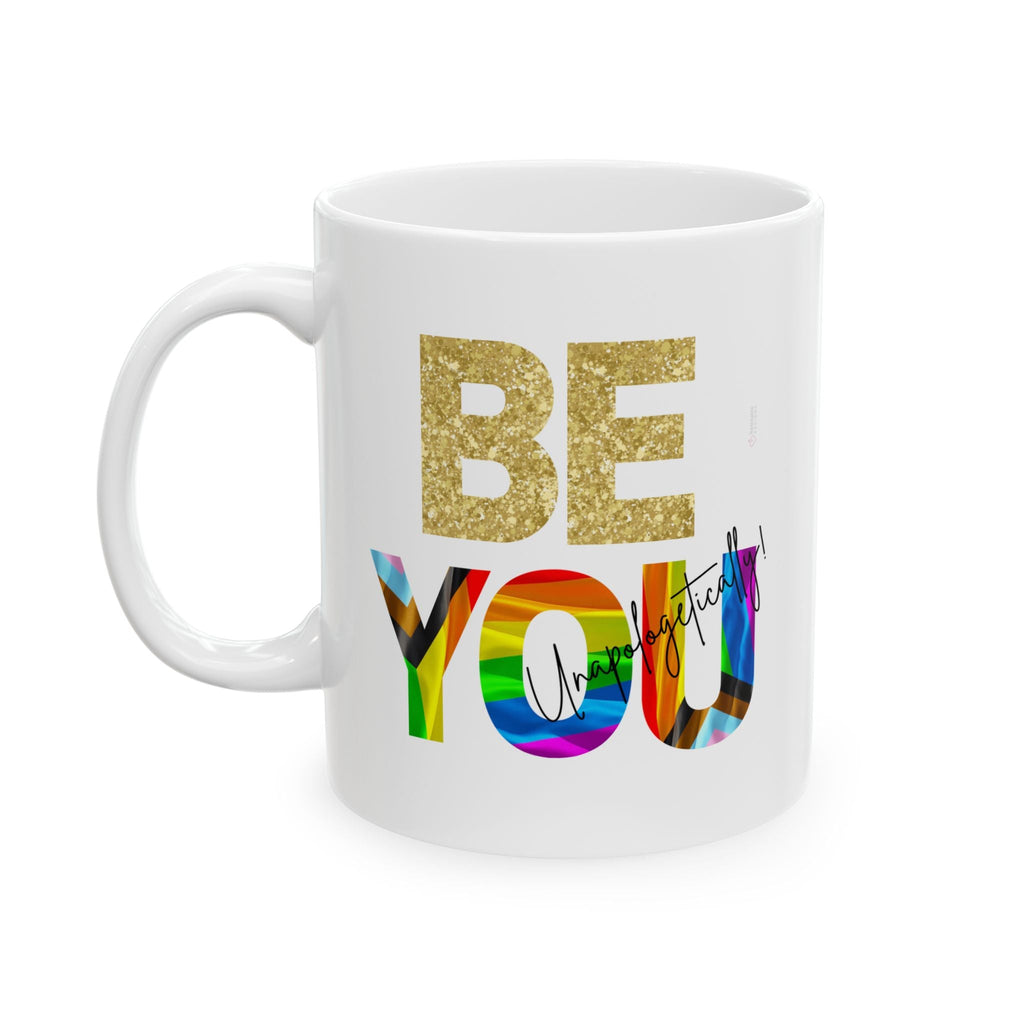 White mug with gold 'BE' and rainbow 'YOU' lettering and LGBTQIA+ heart - Relatable Designs
