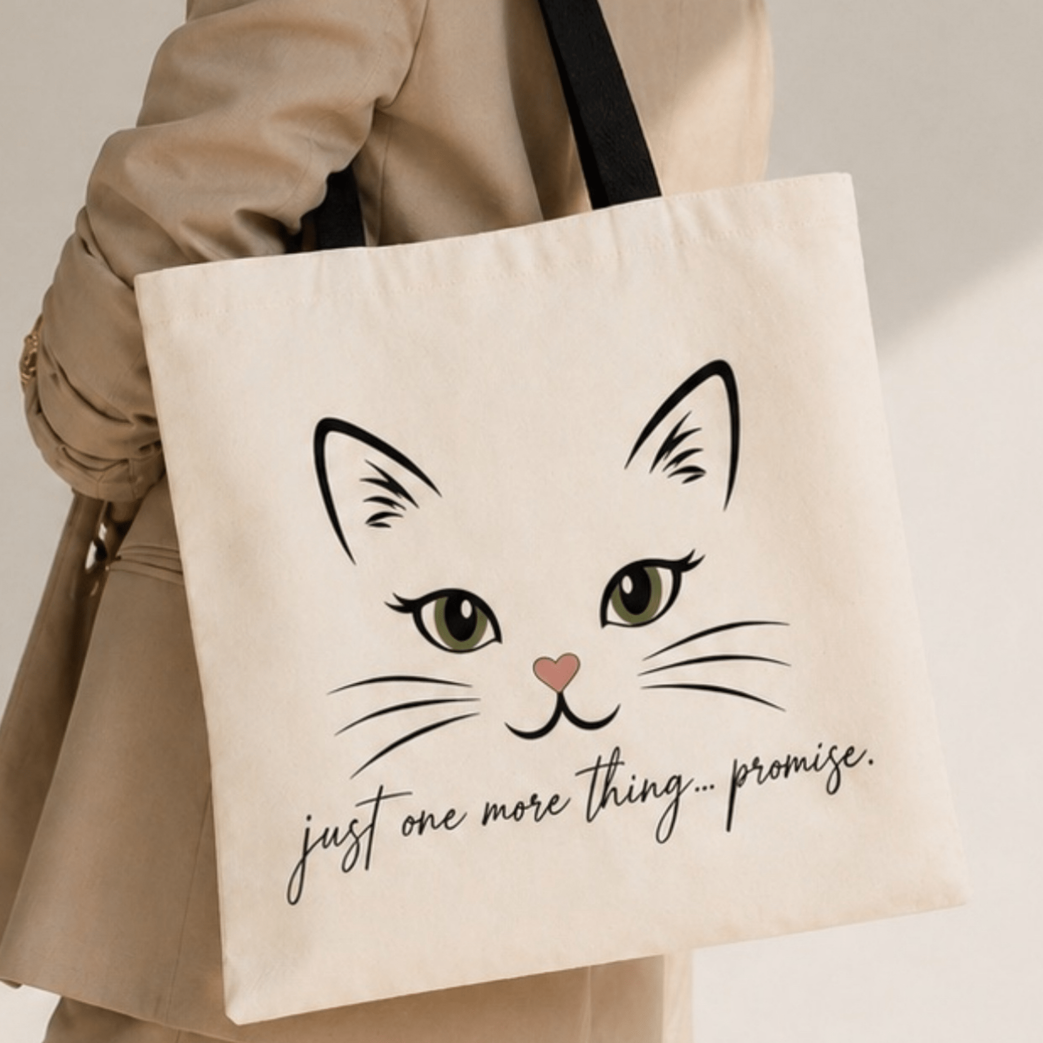 Minimalist cat face tote bag with quote just one more thing promise by Relatable Designs.