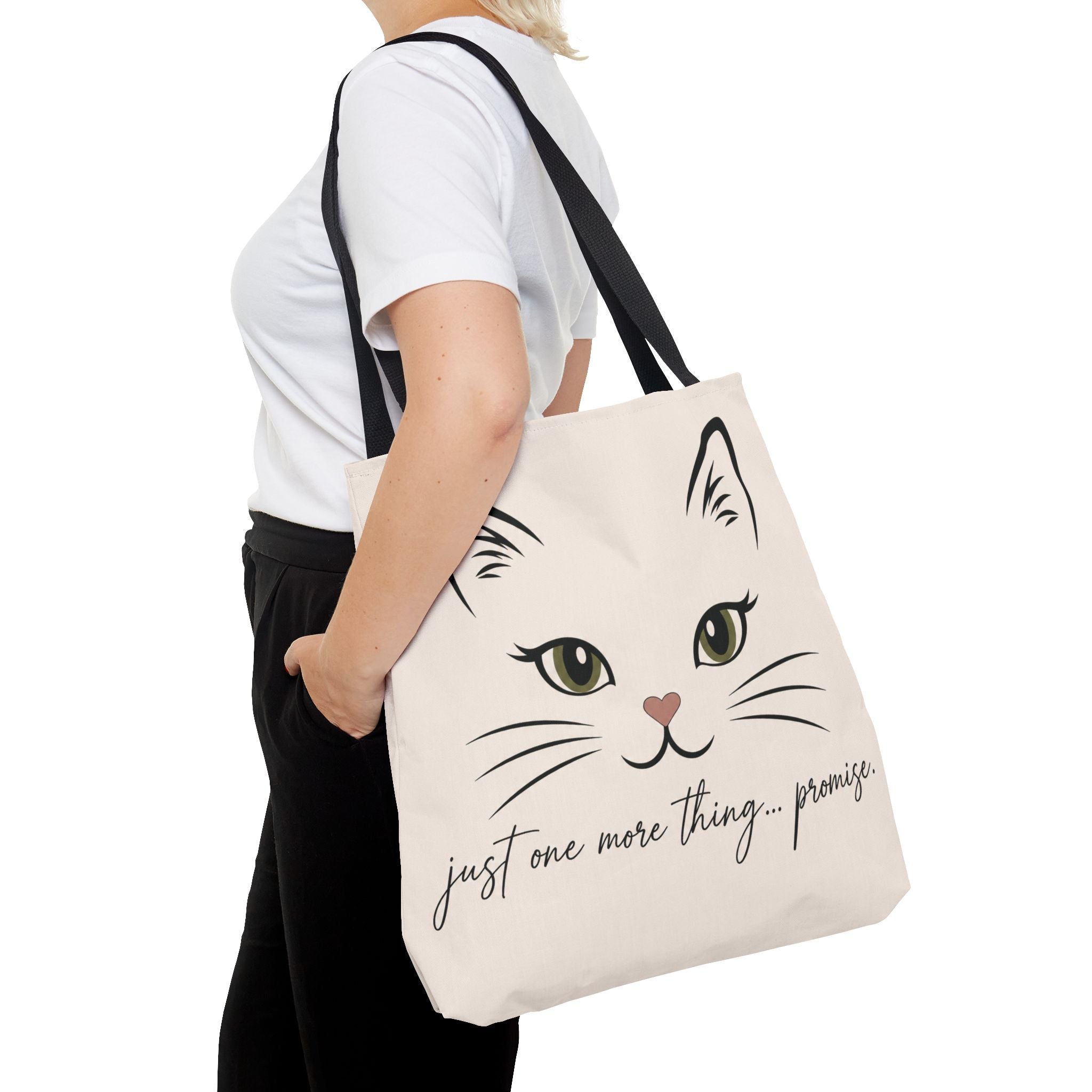 Side view of canvas cat lover tote bag with illustrated cat face