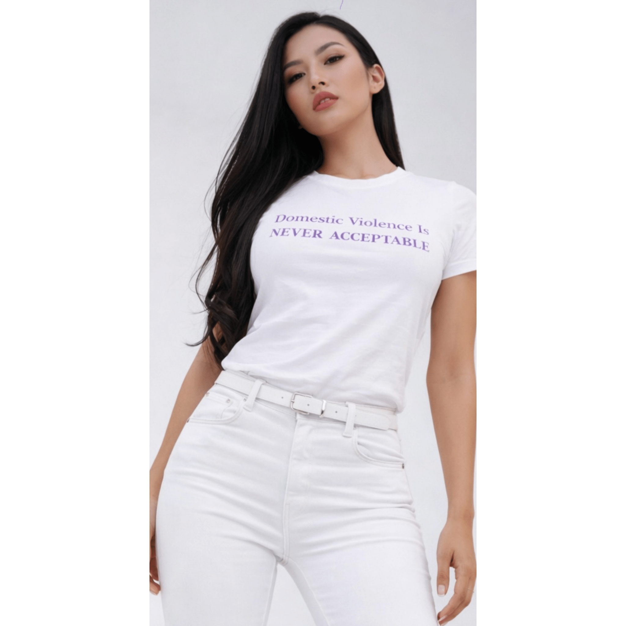 Female model in domestic violence awareness statement t-shirt, fitted white tee by Relatable Designs