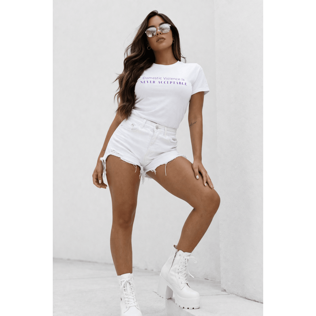 Female model posing in domestic violence awareness statement tee, modern editorial look