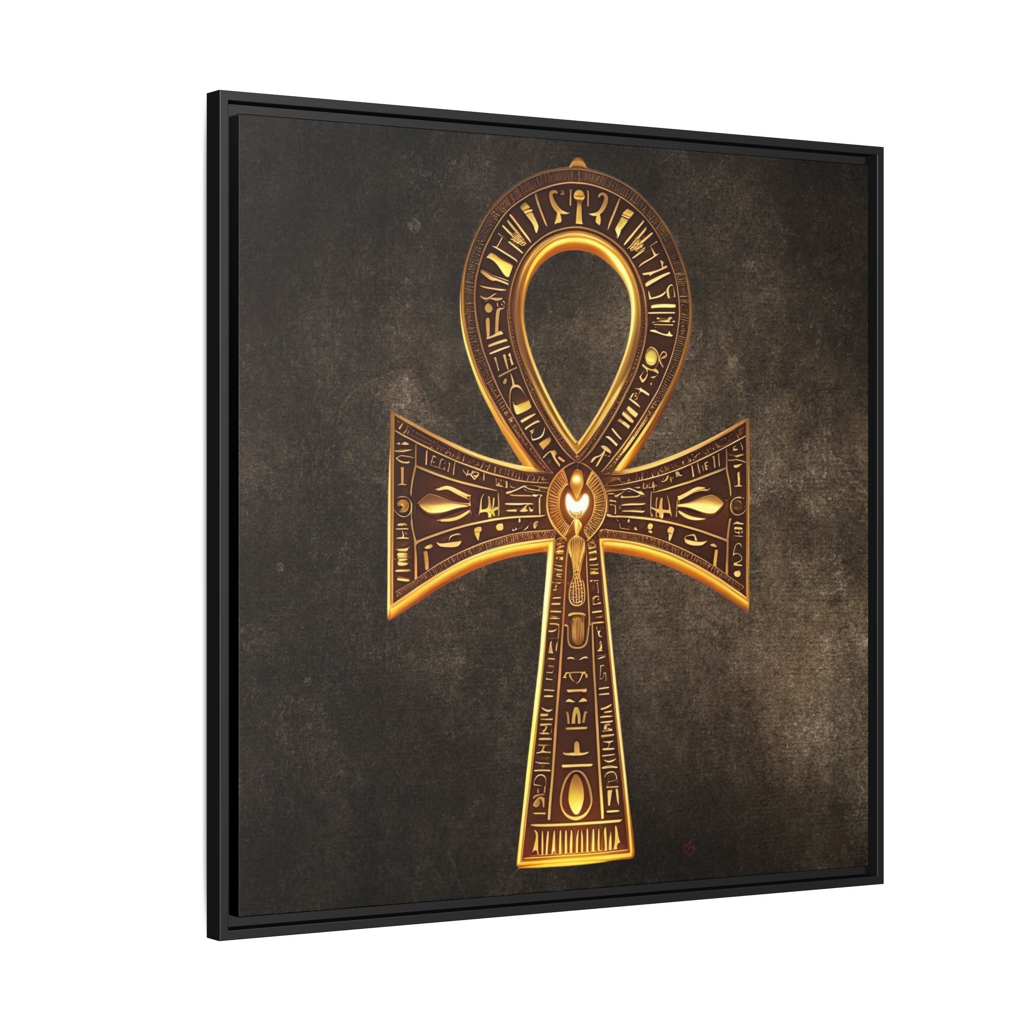 Decorative wall art featuring a gold Egyptian ankh symbol on a dark background