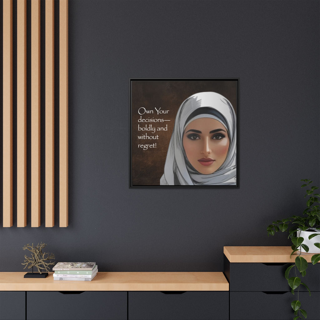 Framed wall decor of a woman wearing a hijab with inspirational quote on a dark wall.