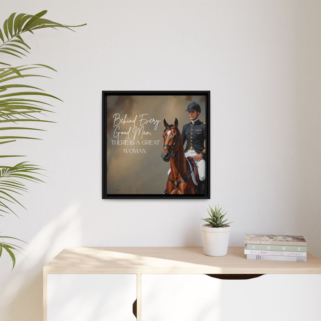 Framed picture of a man on a horse with text above a desk and plant.