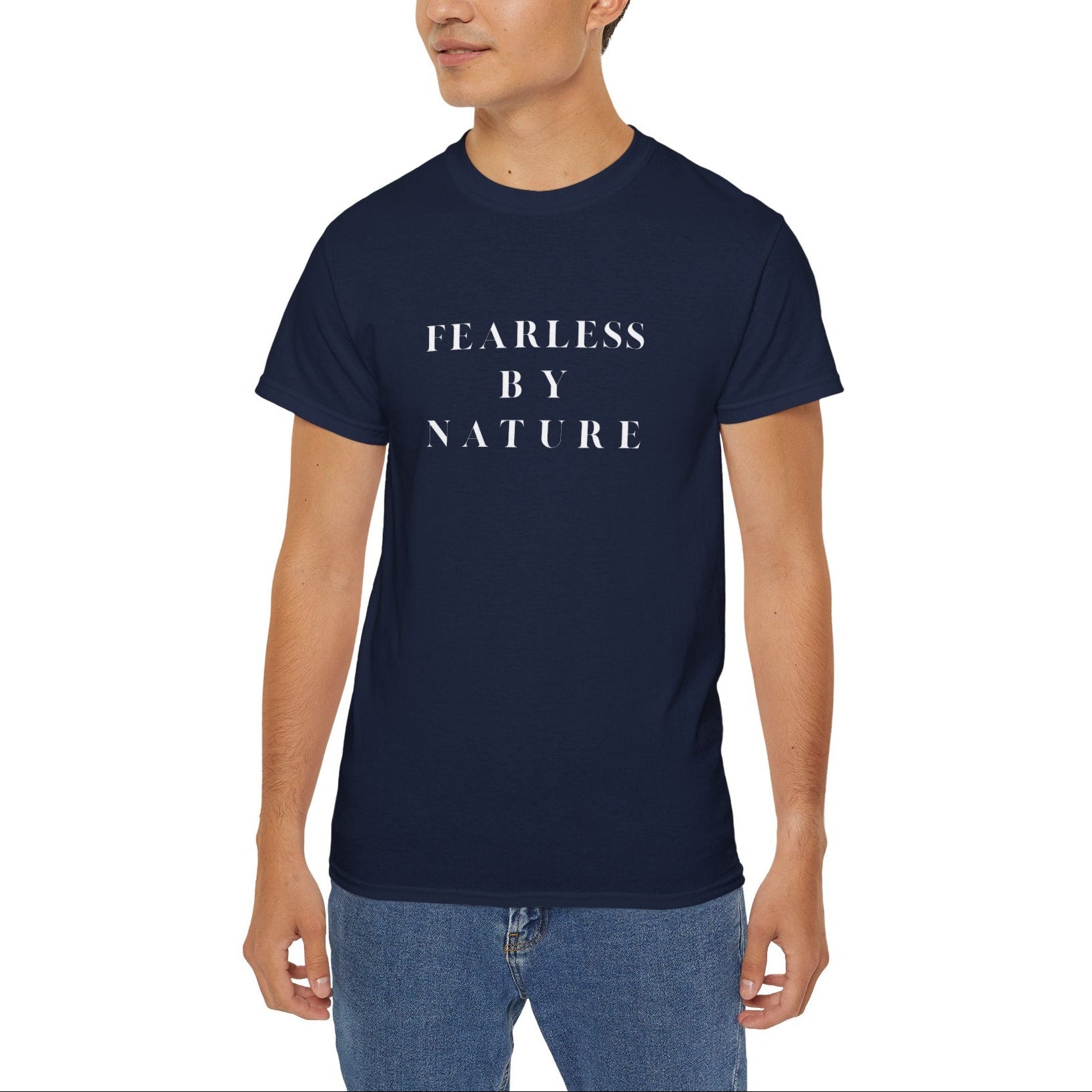 Person wearing a navy blue t-shirt with 'FEARLESS BY NATURE' text on a white background