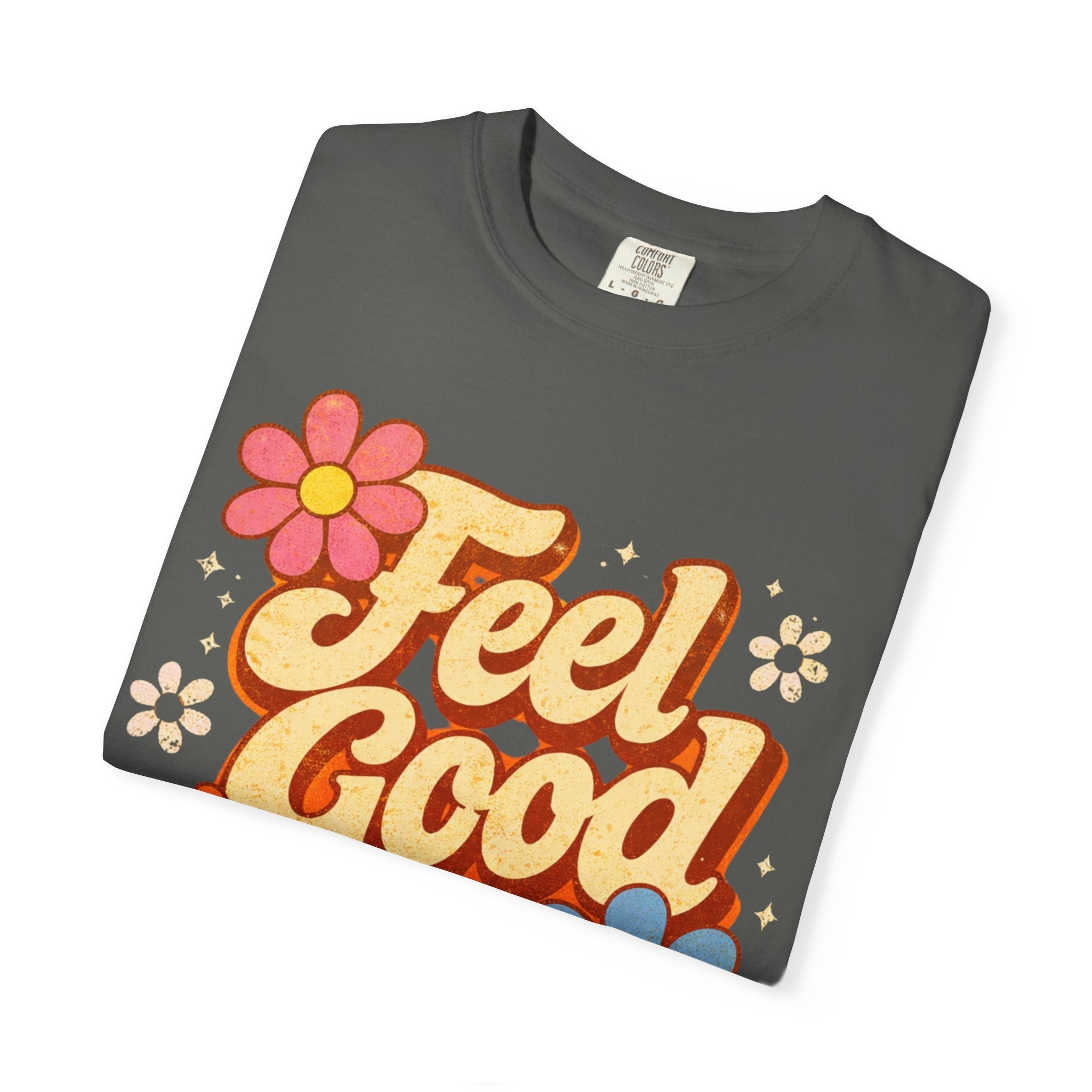 Folded t-shirt with 'Feel Good' graphic design on a white background