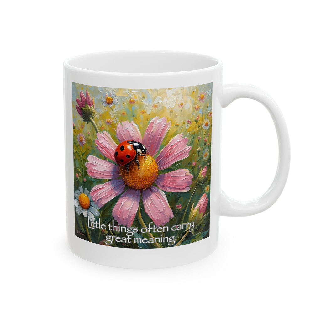 Ceramic Mug with a floral design featuring a ladybug on a pink flower and text 'Little things often carry great meaning' by Relatable Designs