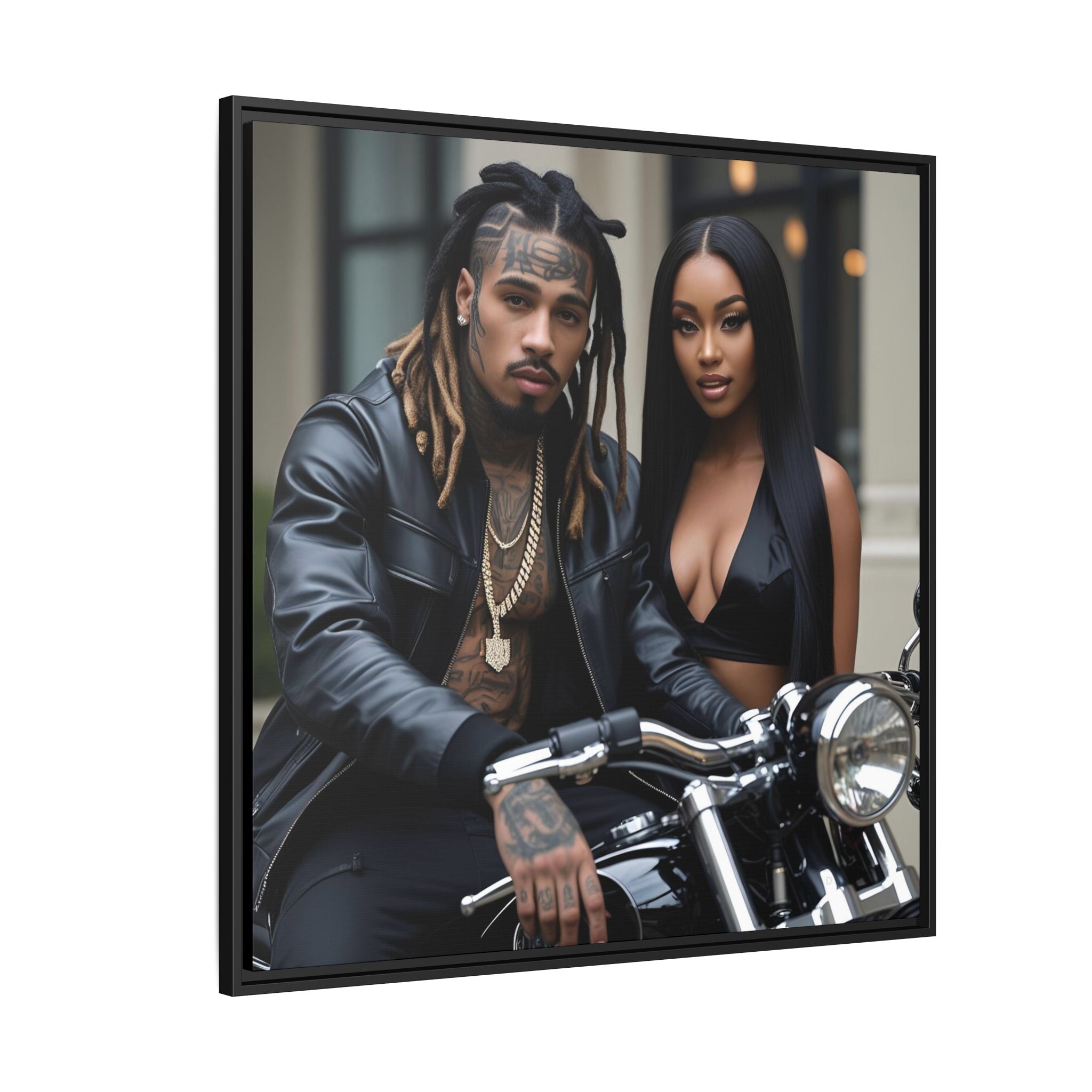 Framed picture of male hip hop artist and woman on a motorcycle