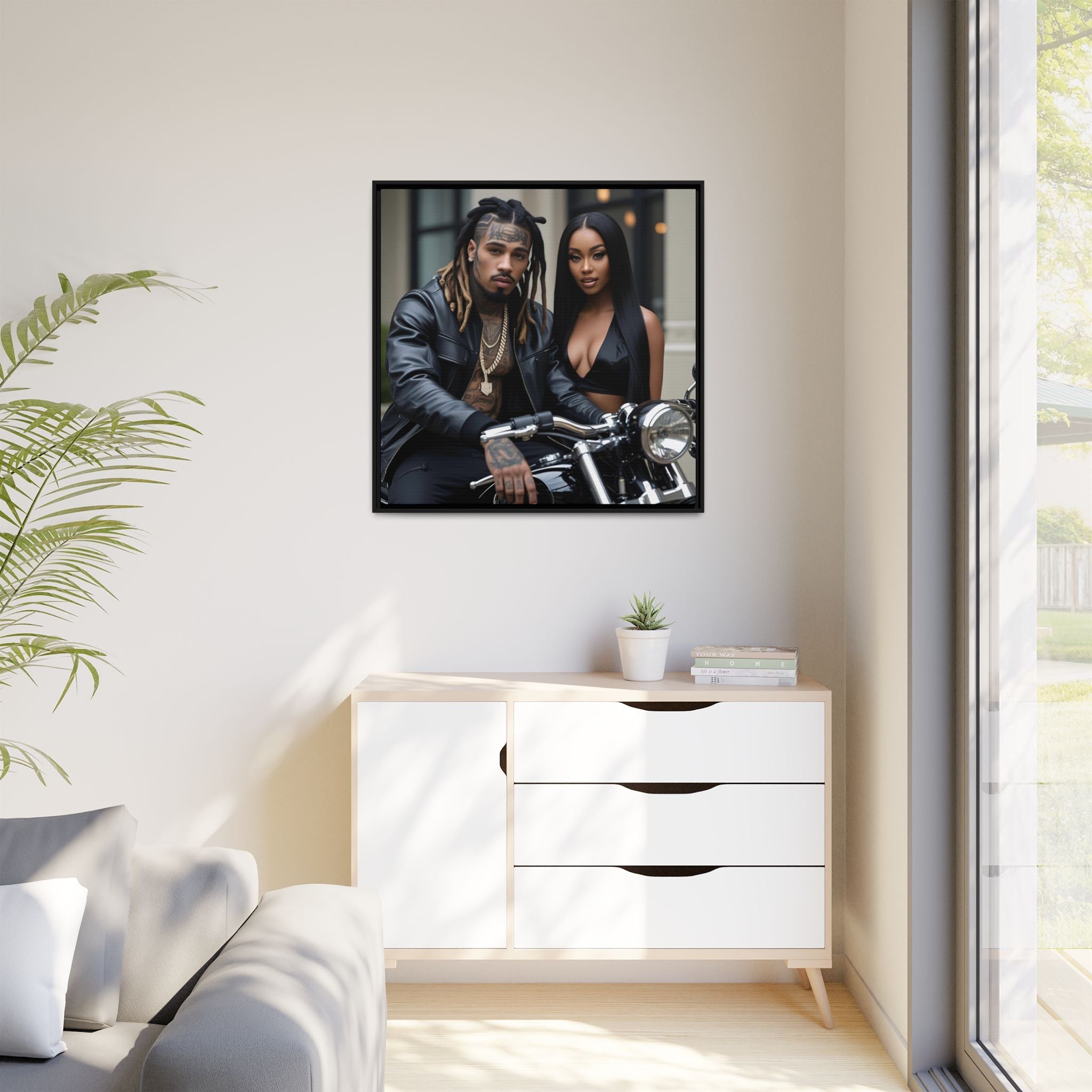 Framed artwork of a couple on a motorcycle in a modern living room.
