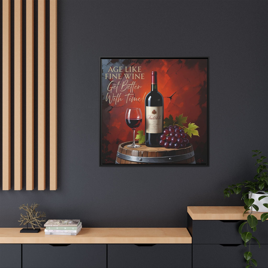 Framed rustic charm artwork of a wine bottle and glass on a barrel with grapes, displayed on a dark wall. 