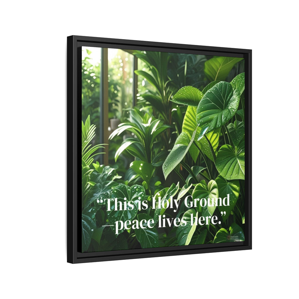 Framed artwork with green foliage and a quote on a white background. Side View.