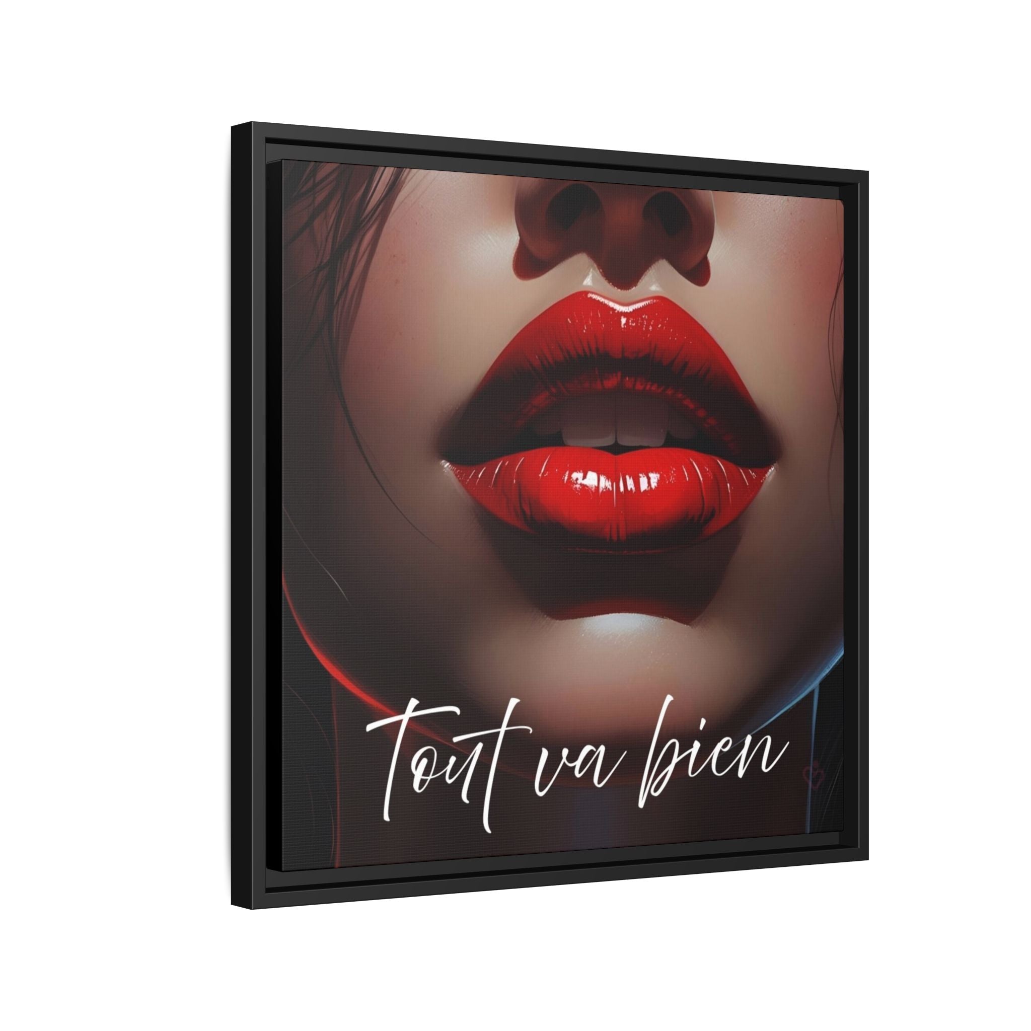 Framed artwork of a woman's face with red lips and motivational text 'Tout va bien' on a white background.