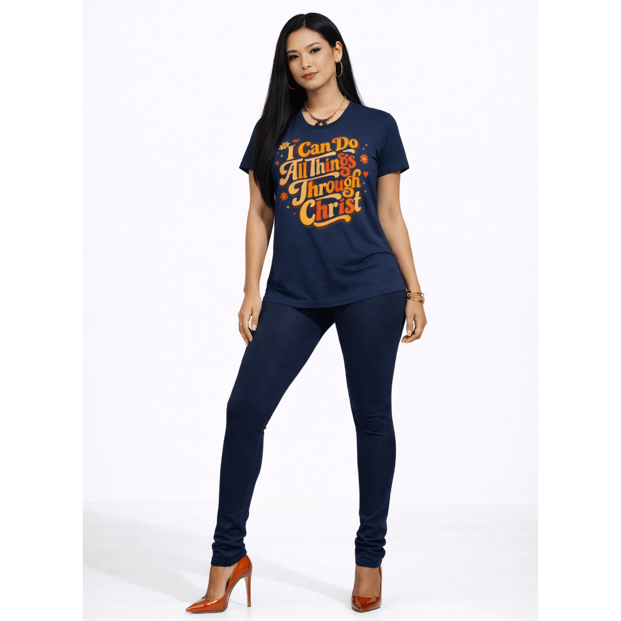Female model wearing a navy blue t-shirt with motivational text with navy blue leggings and stilettos on a white background