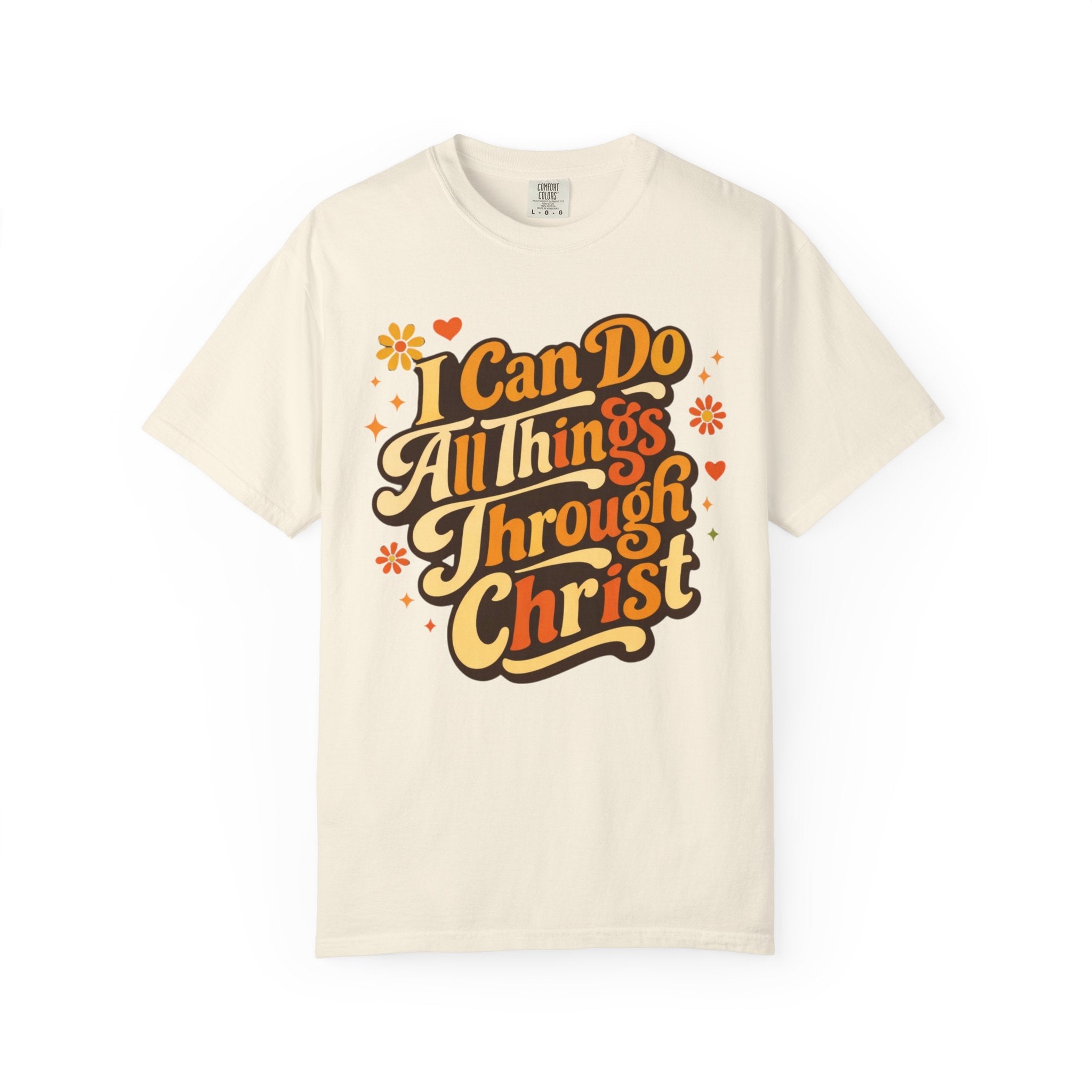 Beige t-shirt with motivational quote 'I Can Do All Things Through Christ' on a white background