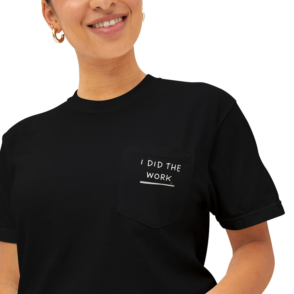 Woman wearing a black t-shirt with 'I DID THE WORK' text on pocket tee on a white background