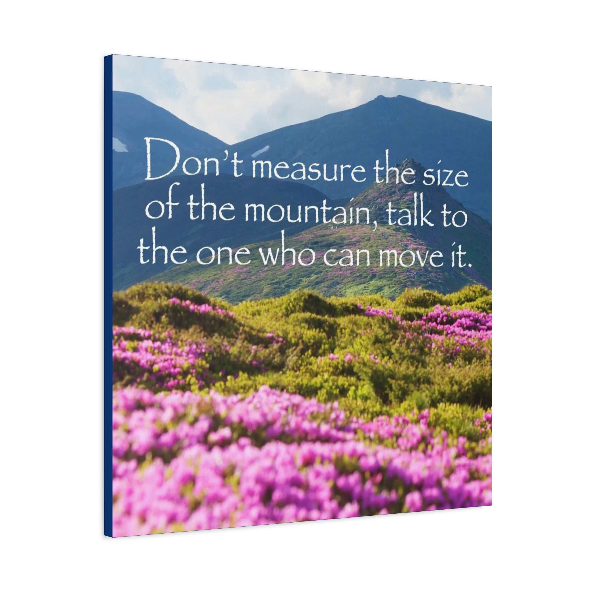 Canvas nature print with mountain and flowers and motivational quote on a white background - Side View.