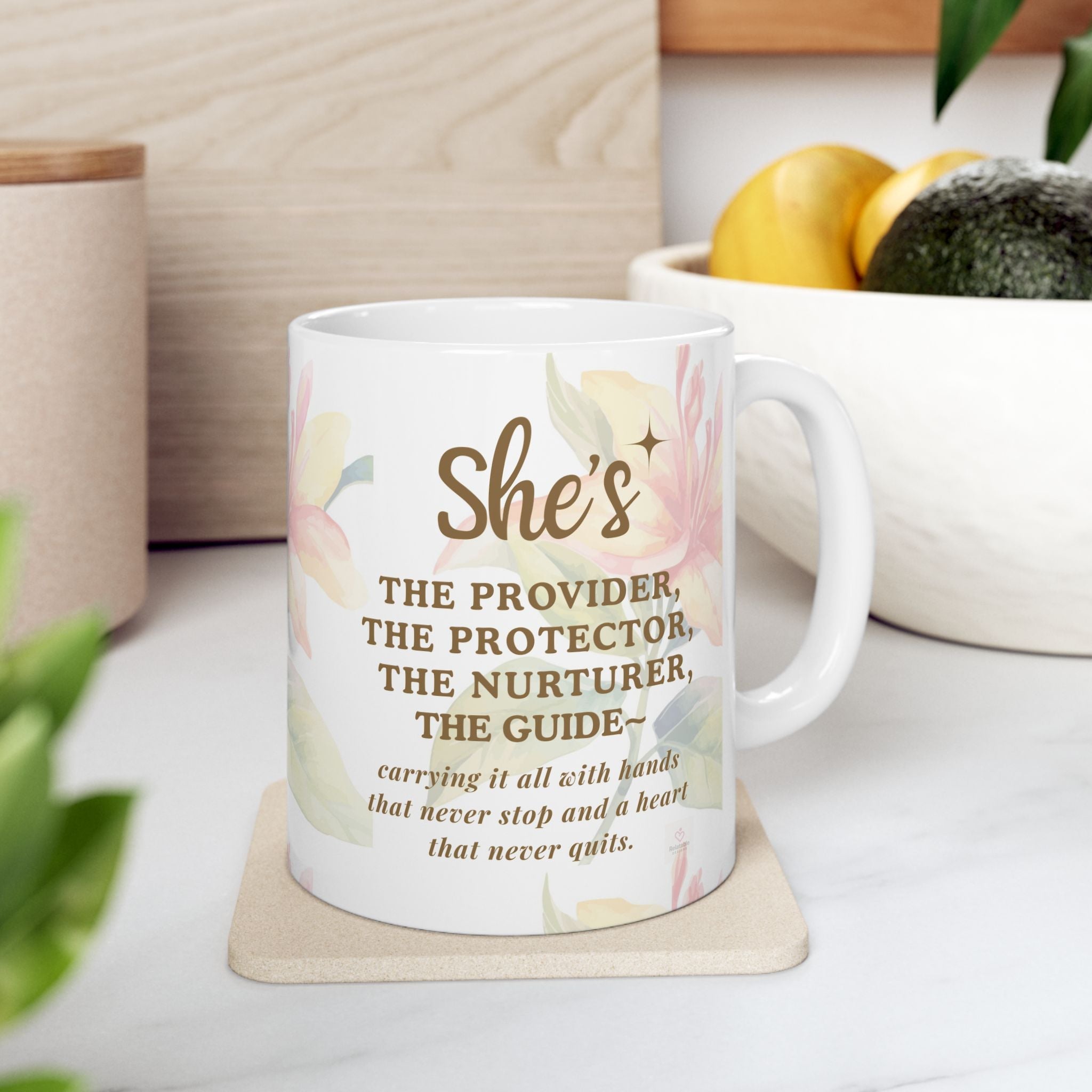 Inspirational mug for mom styled on a kitchen counter with coffee in a cozy home setting by Relatable Designs.