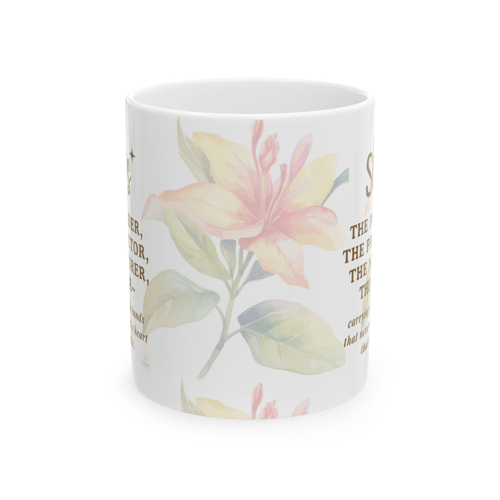 White mug with floral design and text on a white background. Front view.
