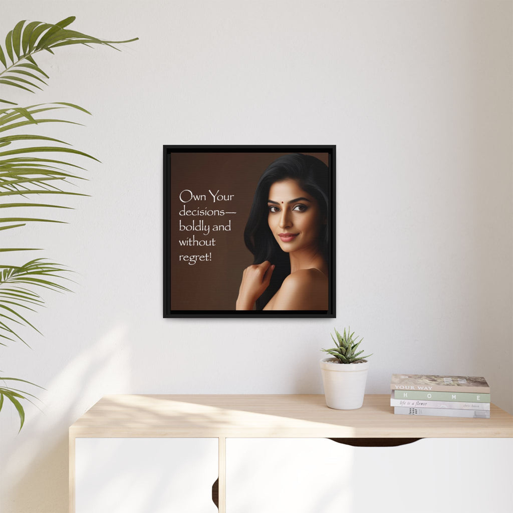 Framed wall art  of a South Asian woman with motivational quote on a wall above a desk with decor items.