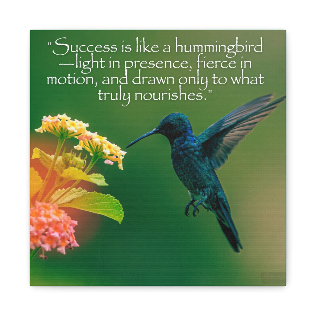 Blue hummingbird near spring flowers with inspirational quote on a green background