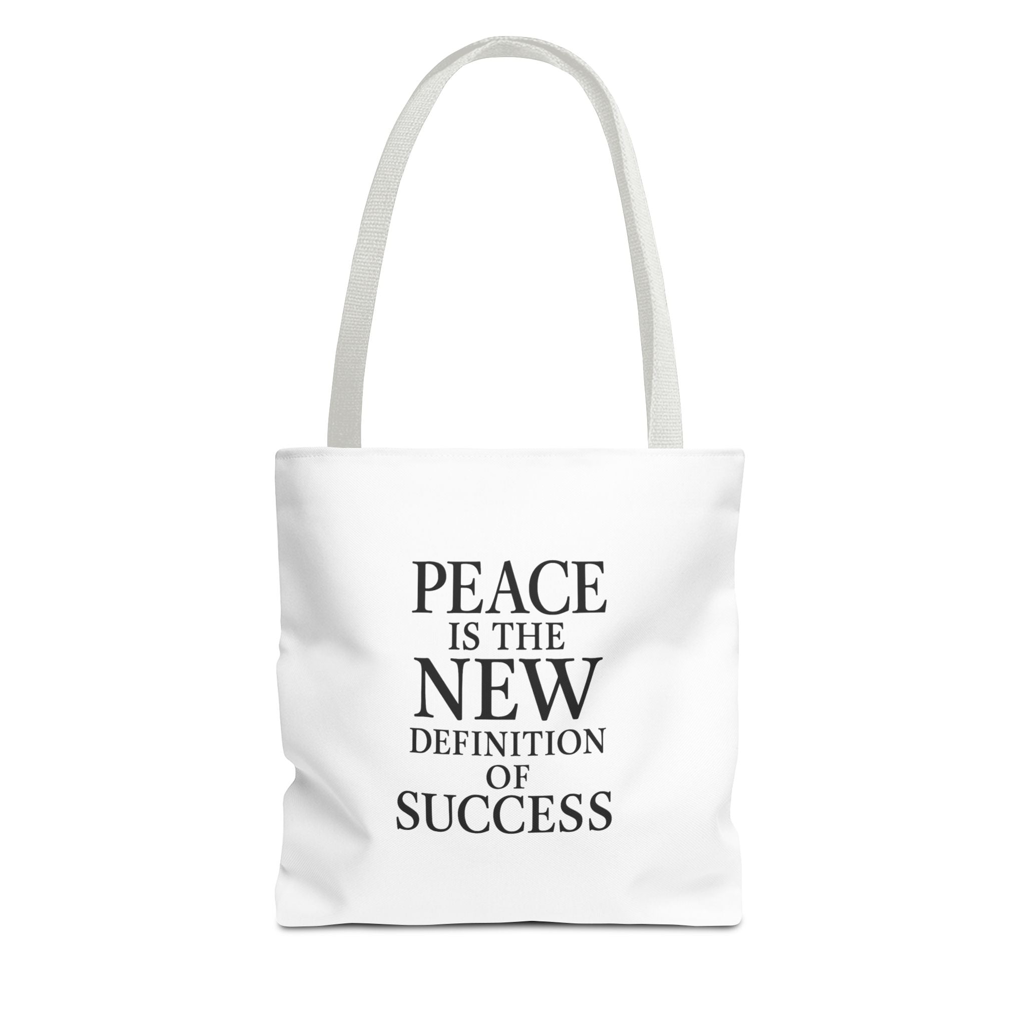White tote bag with 'Peace is the New Definition of Success' text with white handle on a white background