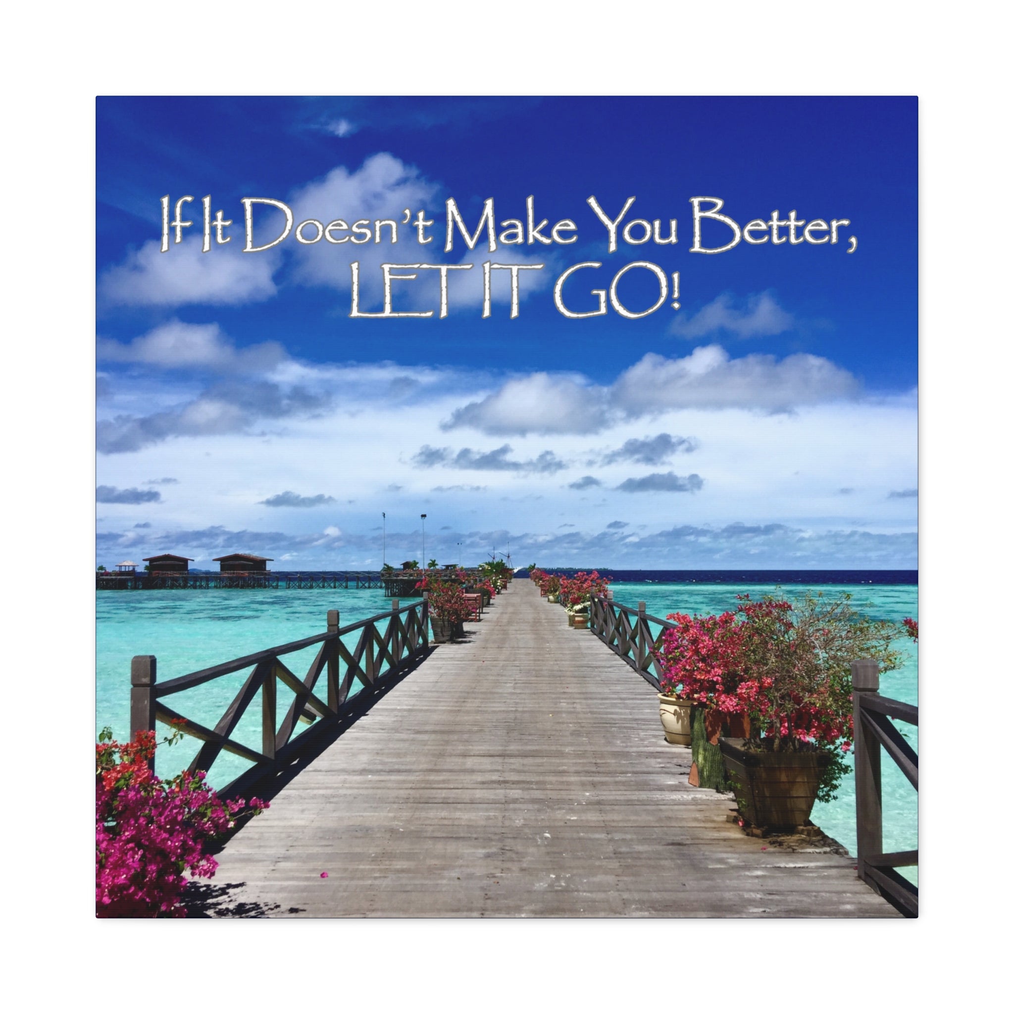 Wooden pier with flowers leading to the ocean under a blue sky with text by Relatable Designs.