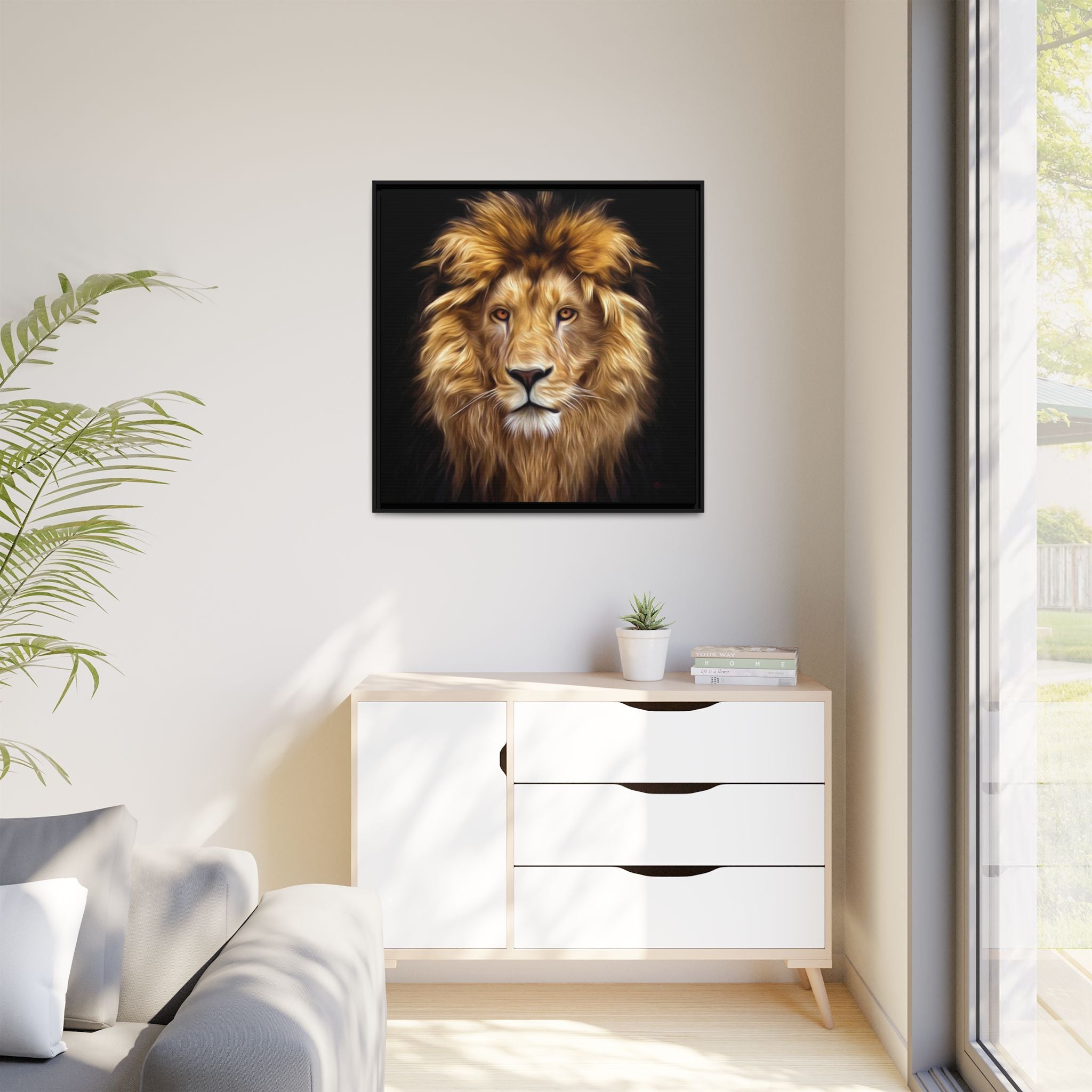 Majestic framed artwork of a lion's head on a wall above a white cabinet with drawers.