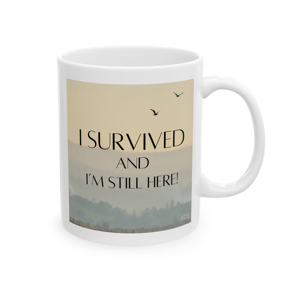 White ceramic mug with scenic design and text 'I survived and I'm still here!' on a white background - Relatable Designs.