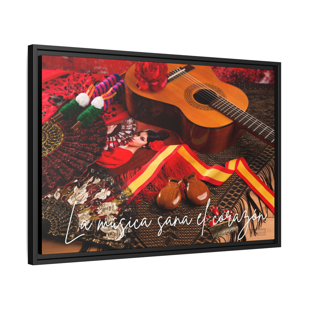 Framed artwork with a guitar, colorful ribbons, and text on a red background.