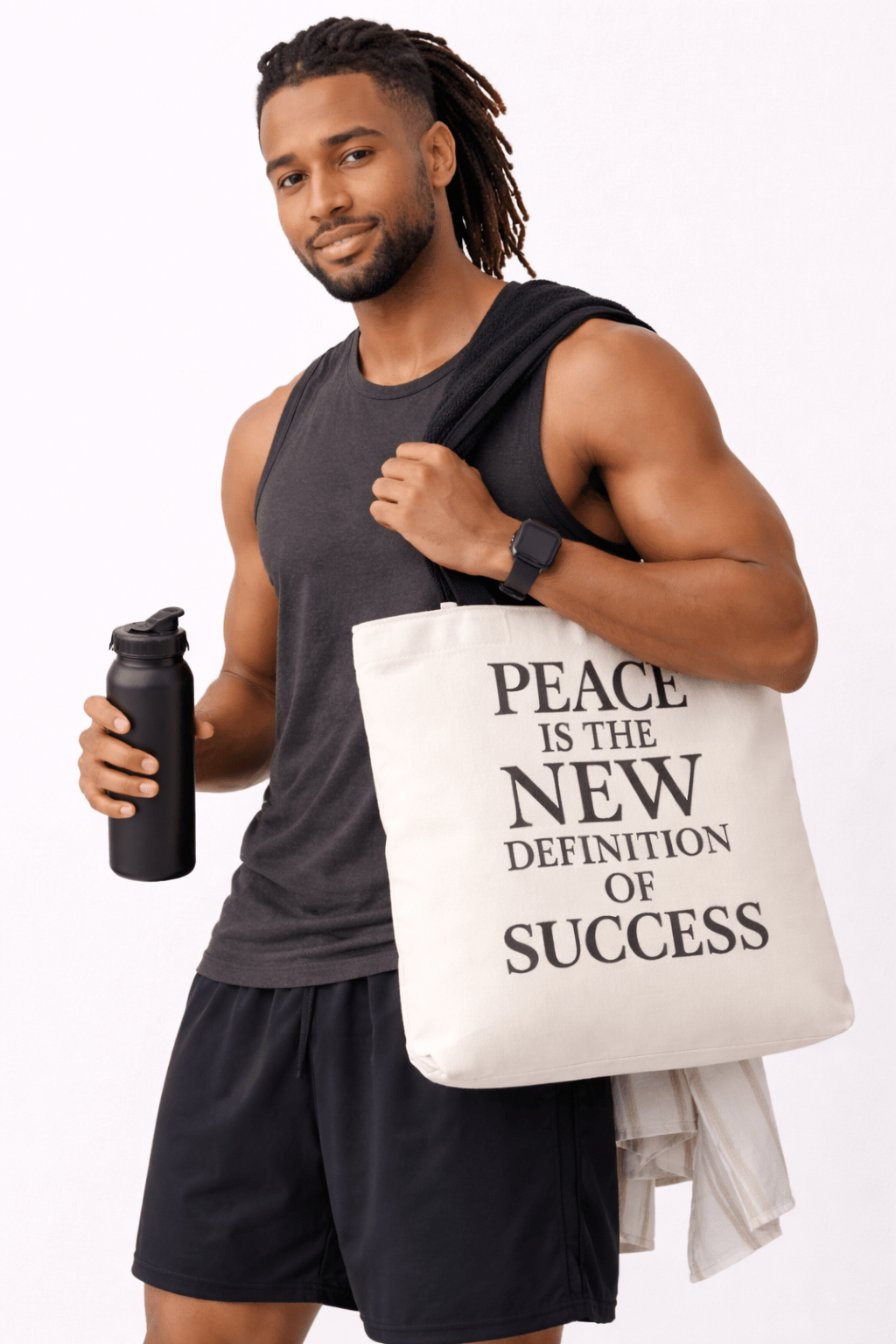 Man holding a water bottle and a tote bag with a motivational quote on a white background