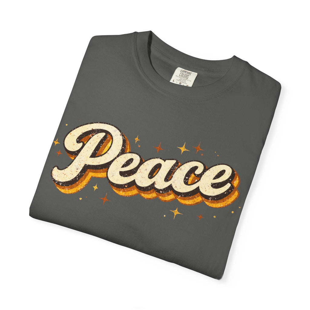 Folded gray t-shirt with 'Peace' print on a white background