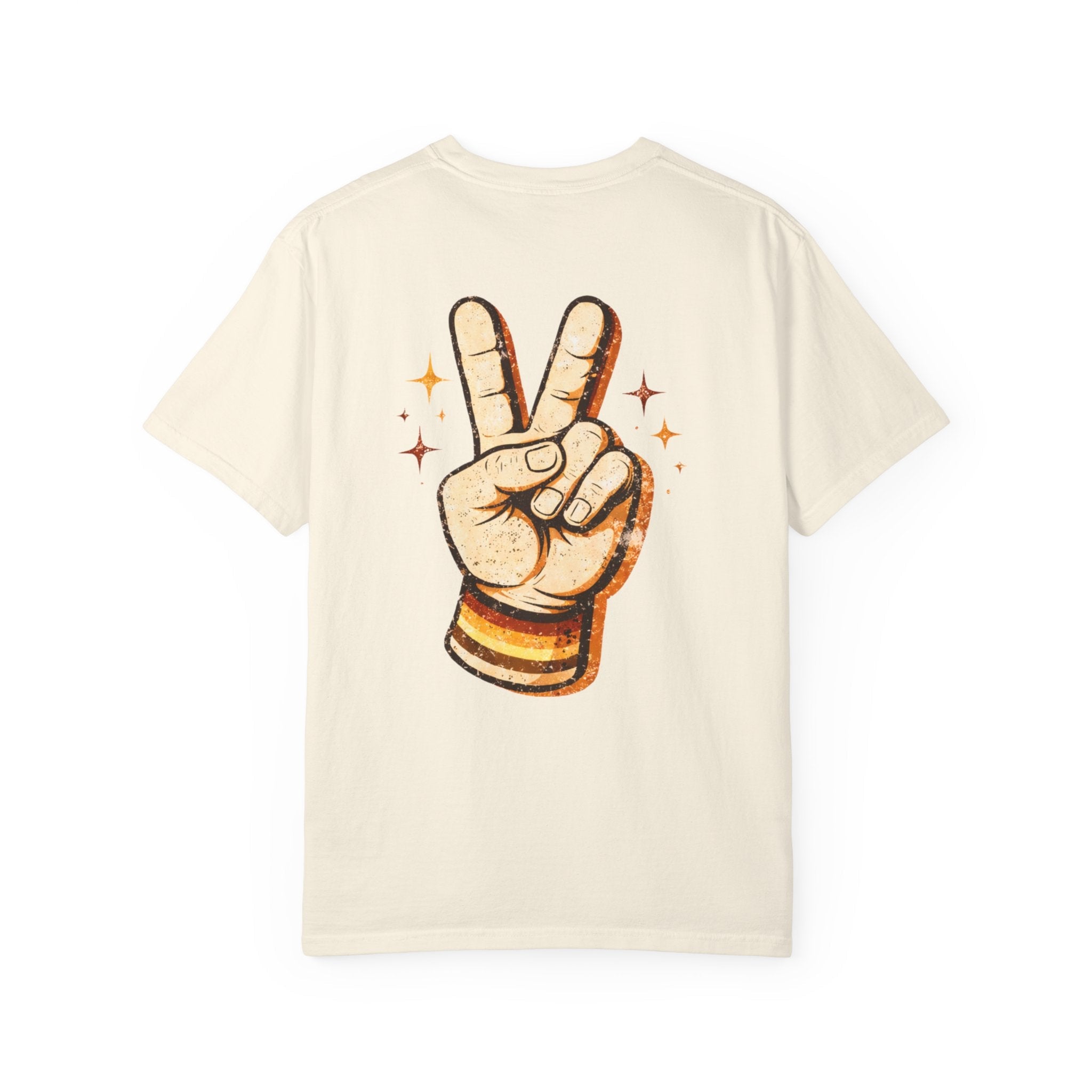 Back view: Beige t-shirt with a hand making a peace sign graphic on a white background