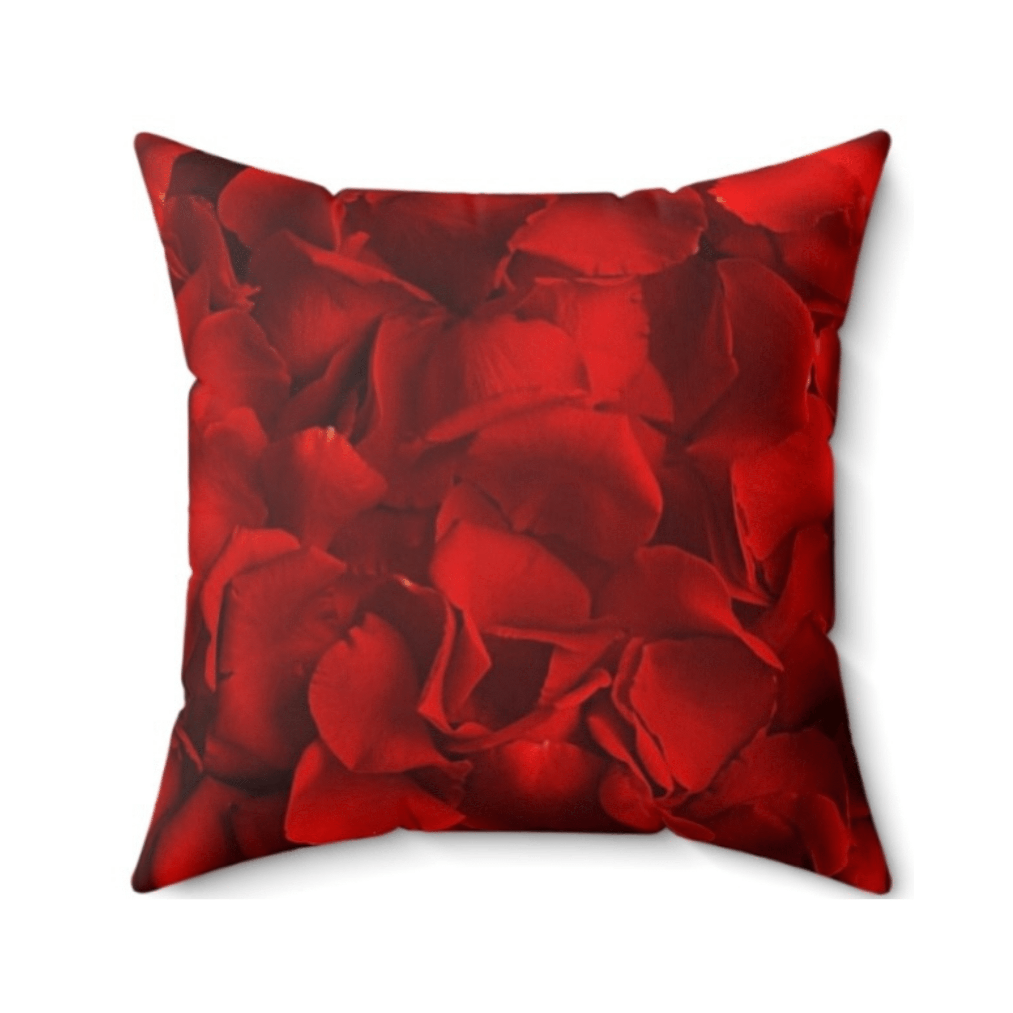 Red rose petals pillow with a white background by Relatable Designs.